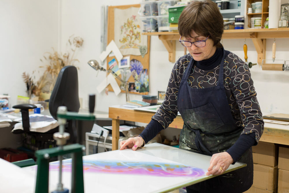 Carol Nunan Printmaker at her Hawthorn etching press in her studio