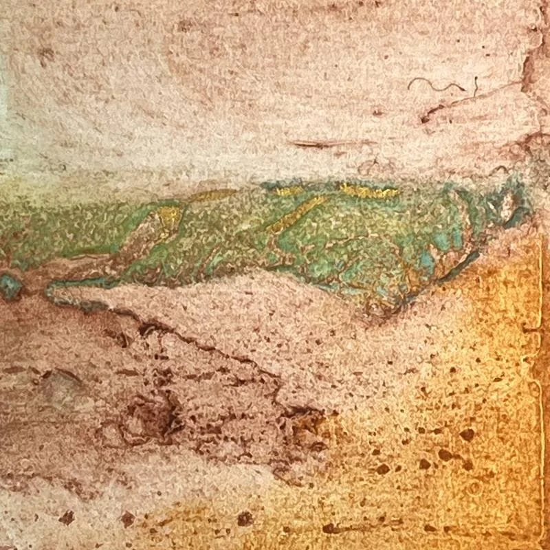 a semi-abstract collagraph mini print using textured wall papers to create rocky strata of a hillside on the horizon