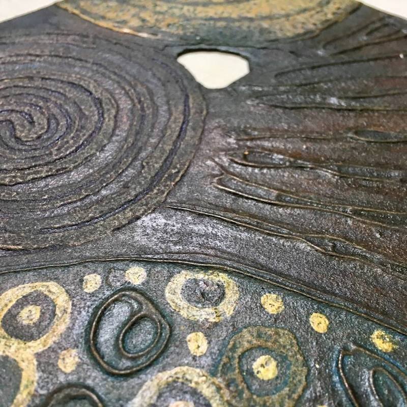 close up Fragments collagraph plate scorched on ply