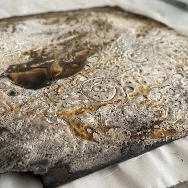 Scorched collagraph plate showing texture — Carol Nunan studio Isle of Bute