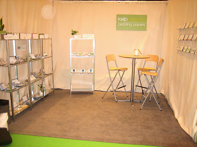 Katie Hunt's first trade show booth in 2009, rebuilt overnight after a fire marshal shut her down.