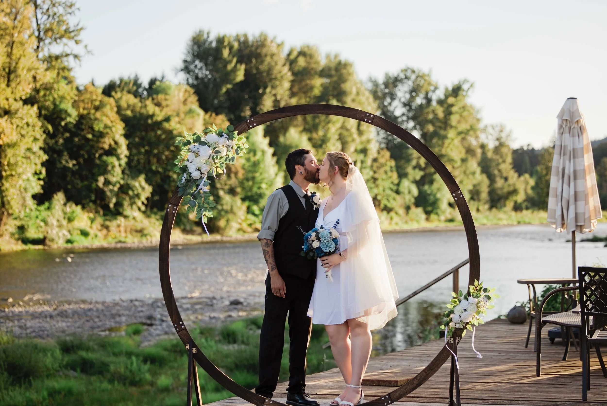 Jodiee and Ethan at the circle arch during their ceremony on the Clackamas River