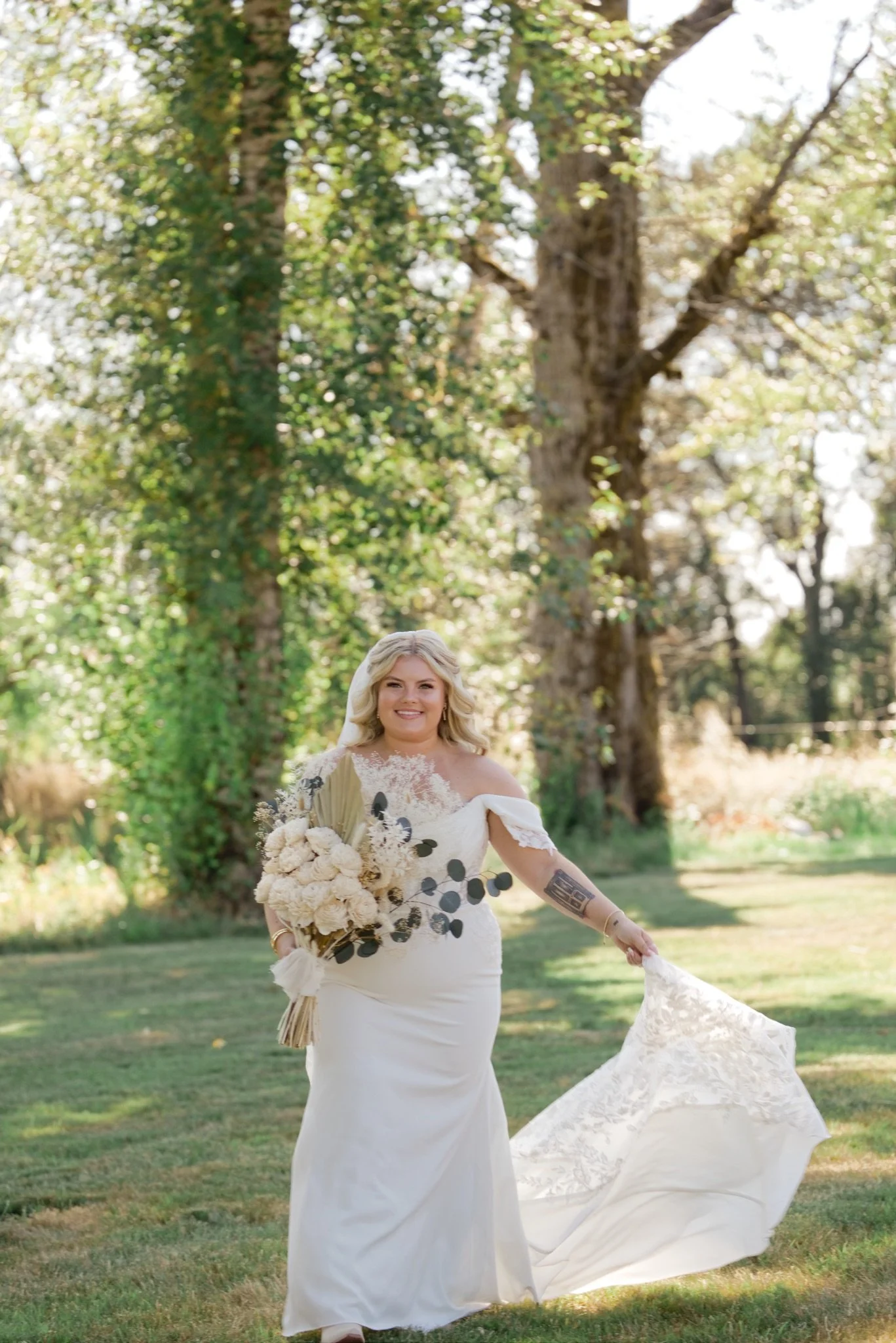 Sarah twirling her dress in the sun on the lawn