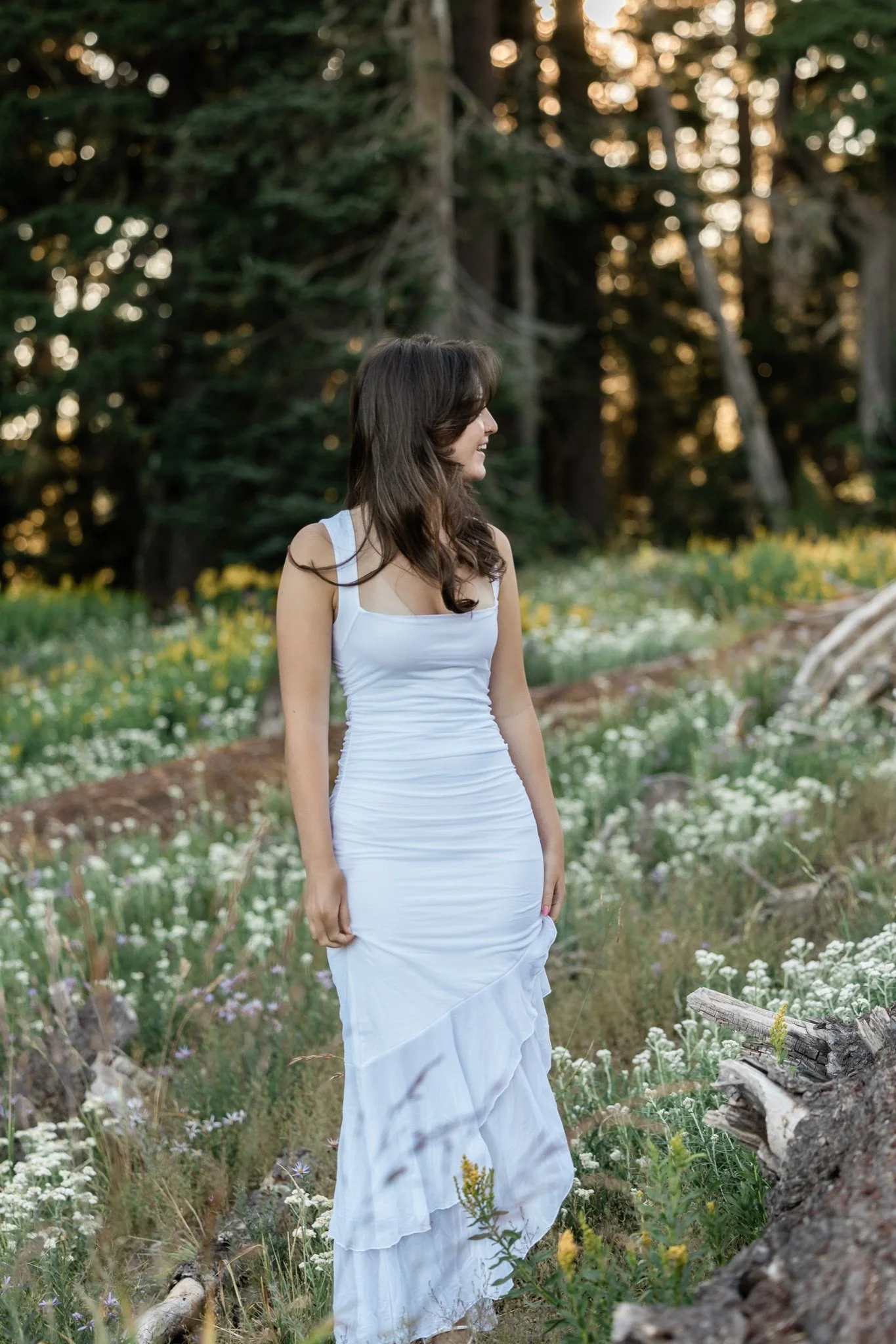 Hailey in a white dress in the wildflower meadow on Mt Hood at golden hour