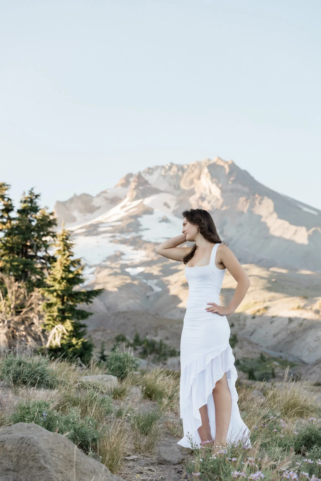 Hailey standing on the rocks below the summit of Mt Hood, Trillium Lake senior photos
