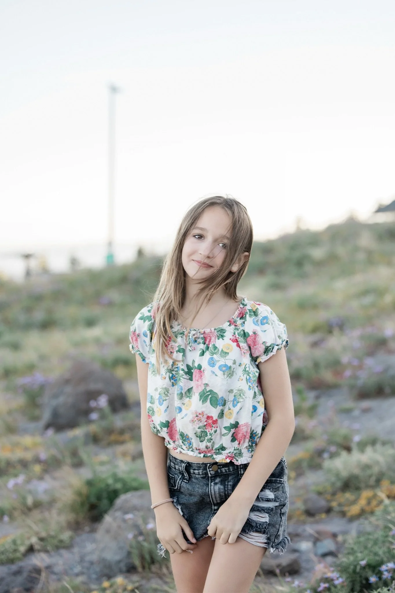 Hailey in a floral top on the rocky slope near Timberline