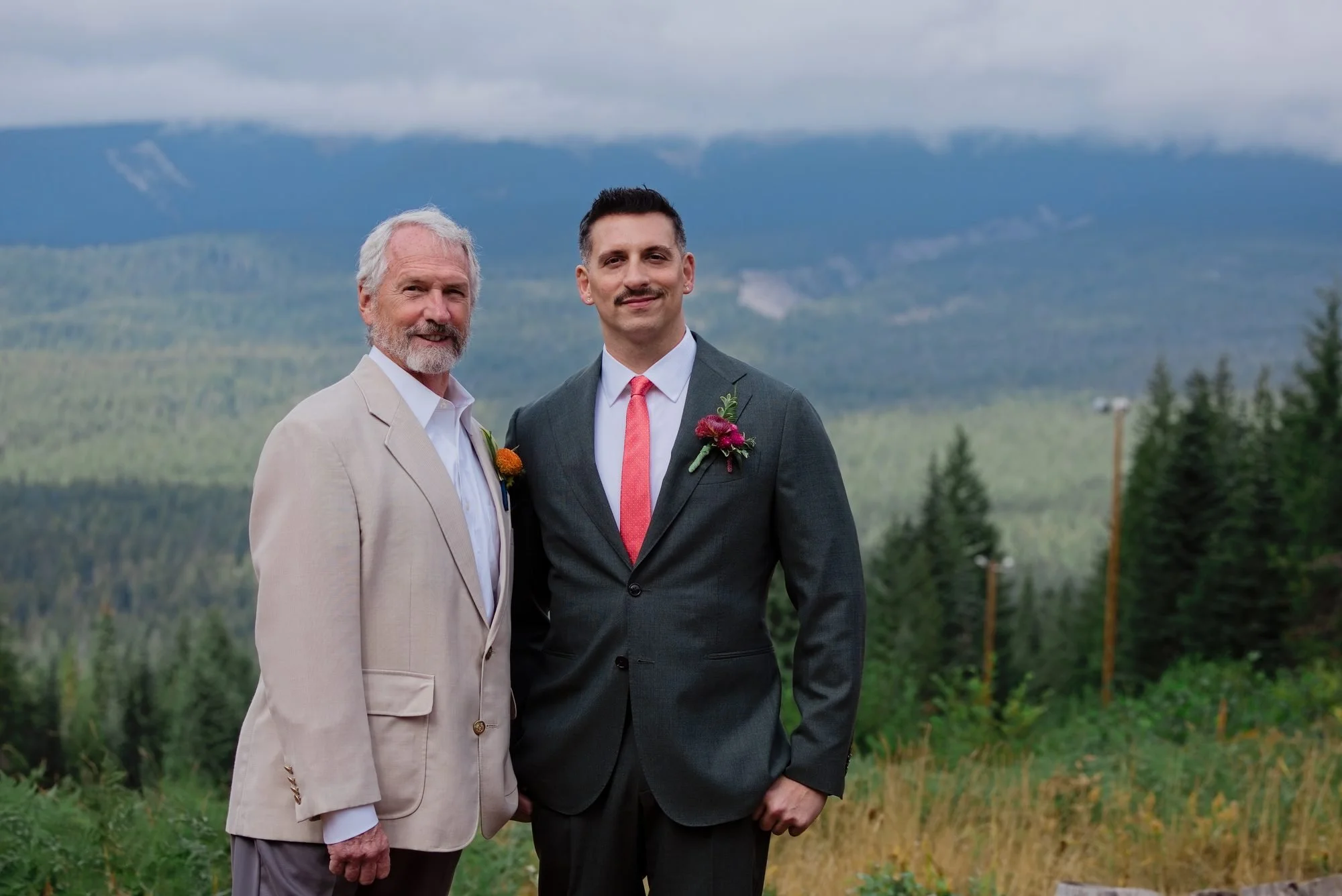 The groom with a family member on the ski slope at Mt. Hood Skibowl before the ceremony