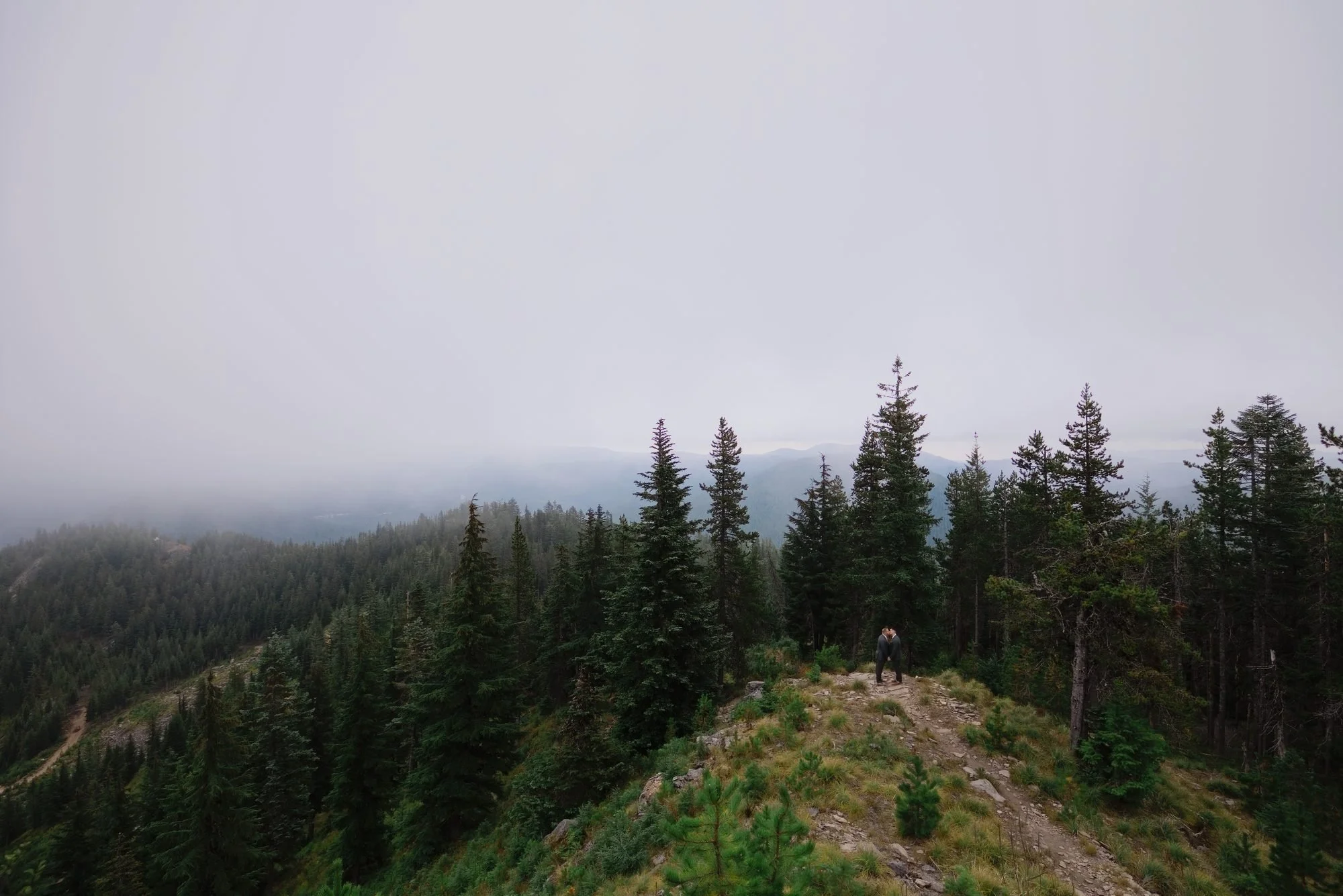 Fog rolling over the forested ridges above Mt. Hood Skibowl on the wedding day