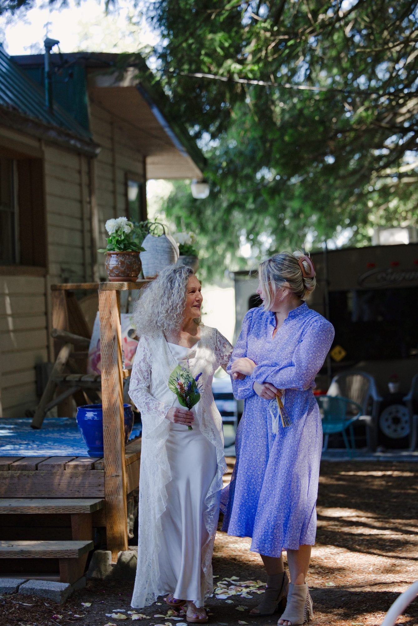 Trudy walking to the ceremony with her daughter in her backyard in Troutdale Oregon