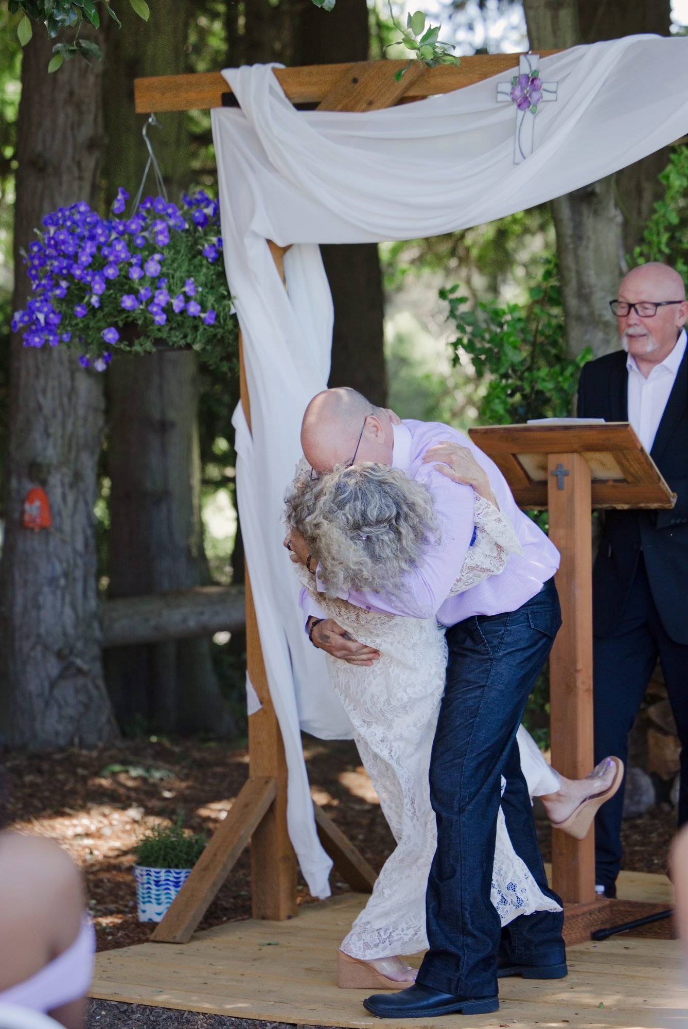 Michael dipping Trudy for a kiss at the end of the ceremony, Troutdale Oregon wedding photographer
