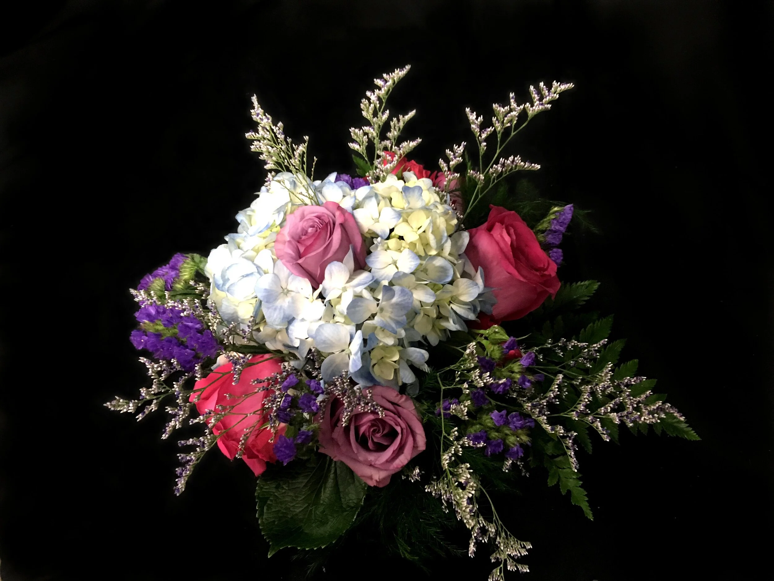 blue+hydrandea+in+a+square+glass+vase+with+lavender+flowers+and+limonium.jpg