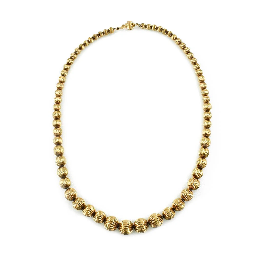 Graduated Ribbed Bead Gold Necklace