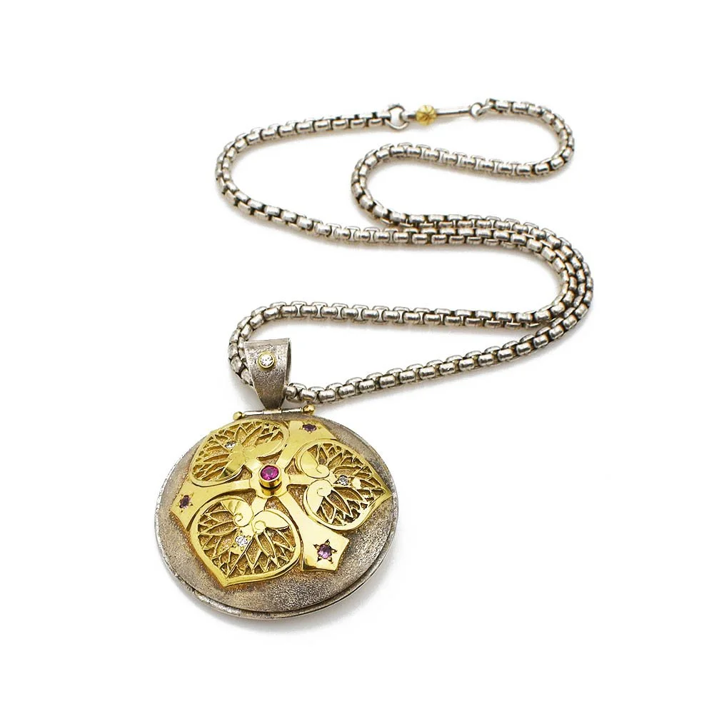 James Cleland Spinning Hollyhock Pendant