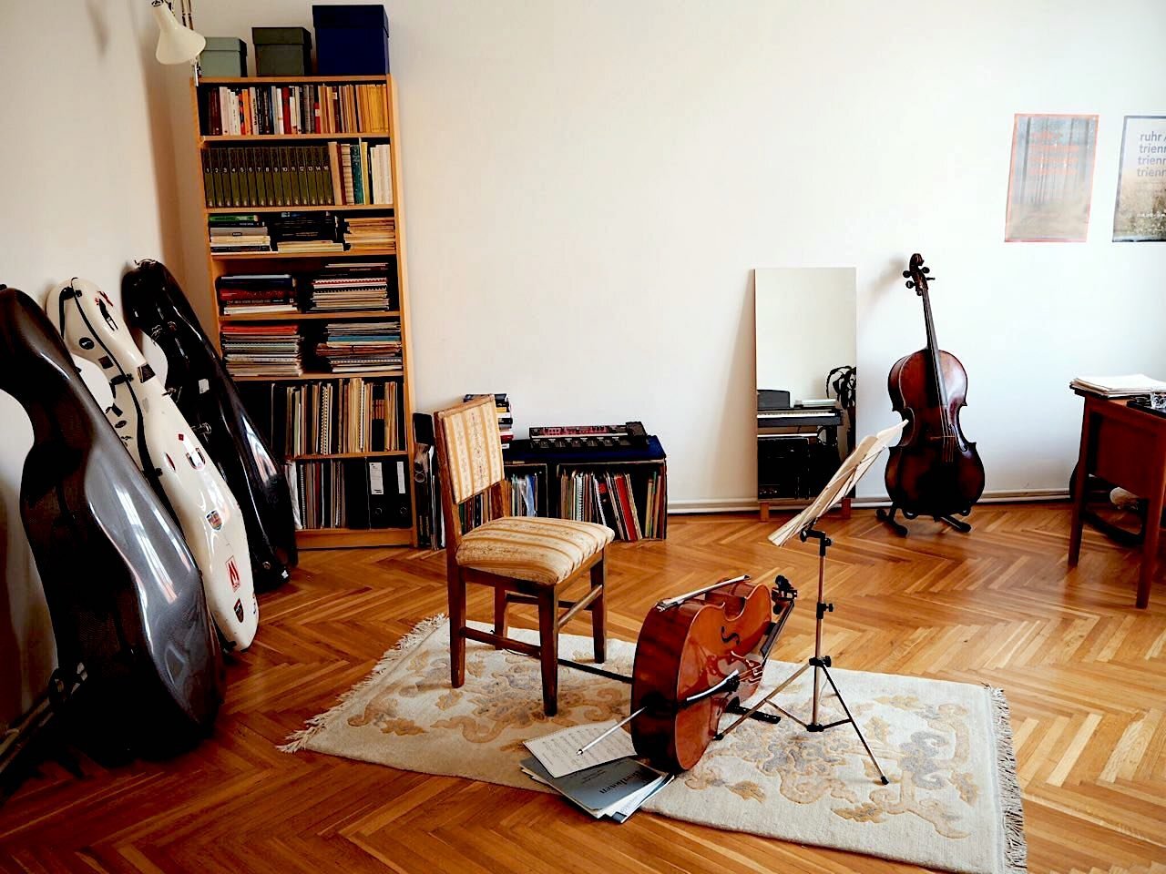 Prepare the instruments for a photo session  If your room has a piano, open the lid for both the top and keyboard. A cello, double bass or violin? Take them out of their cases and show them off!