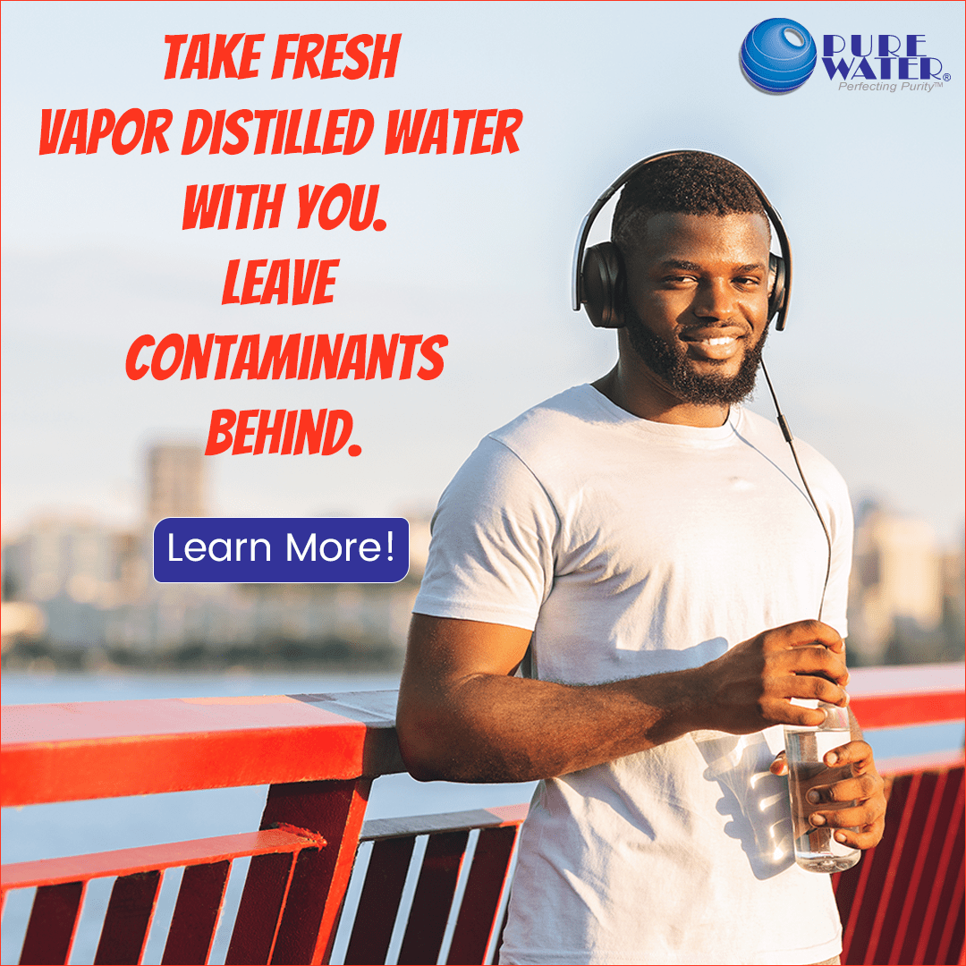 A smiling man wearing headphones and a white t-shirt holding a glass of water, standing outdoors near a red railing with a cityscape in the background. Text on the image urges to take fresh vapor-distilled water and leave contaminants behind, along with a 'Learn More!' button. The Pure Water logo is in the top right corner.