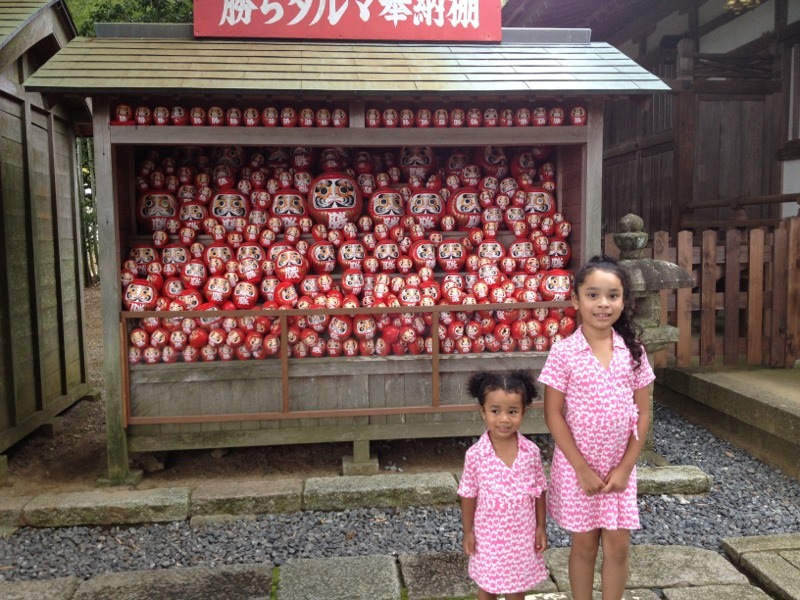 Daruma, good luck charms, outside a temple in Japan