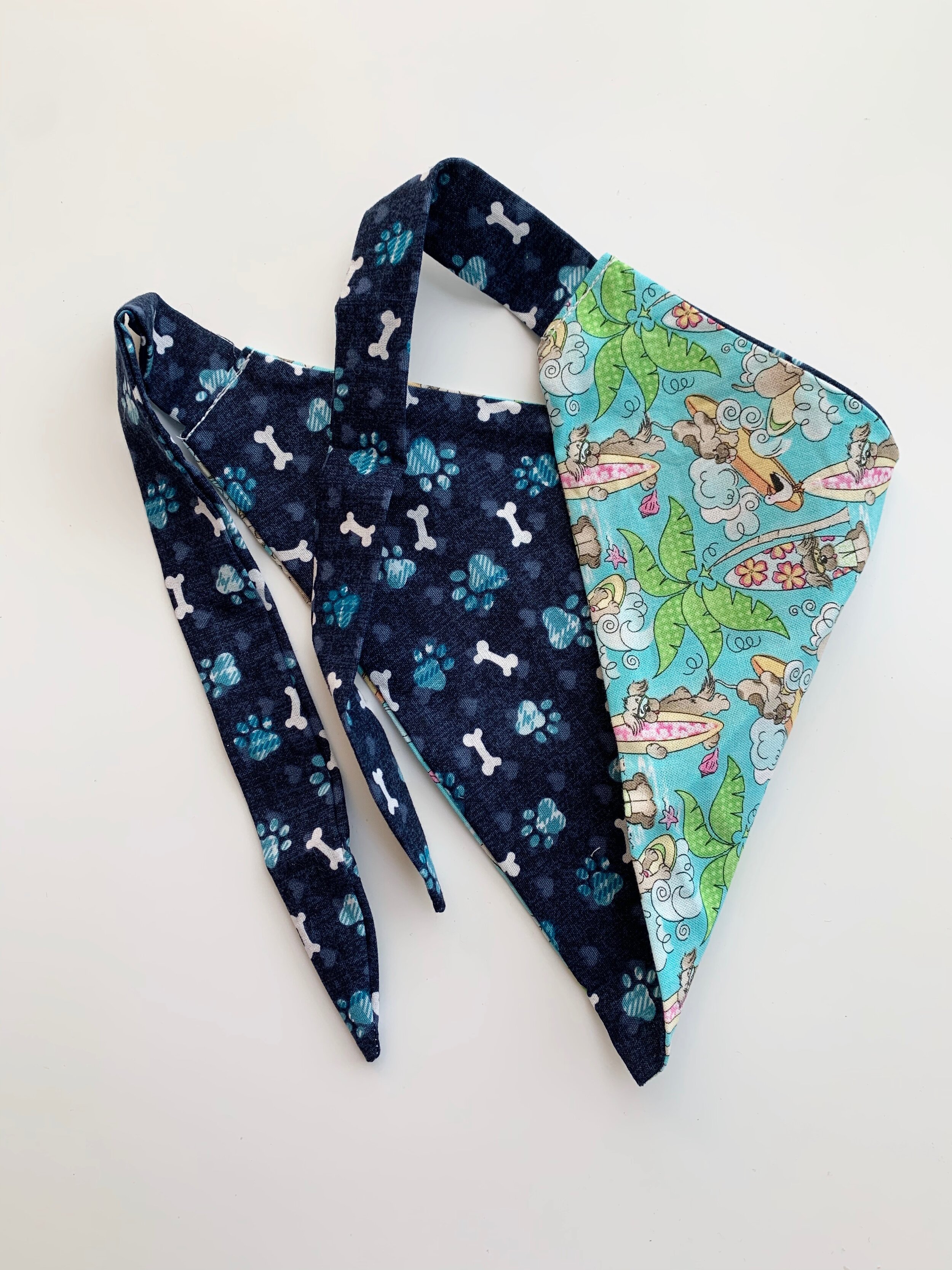 reversible dog bandana: surfing dog/ball + bones