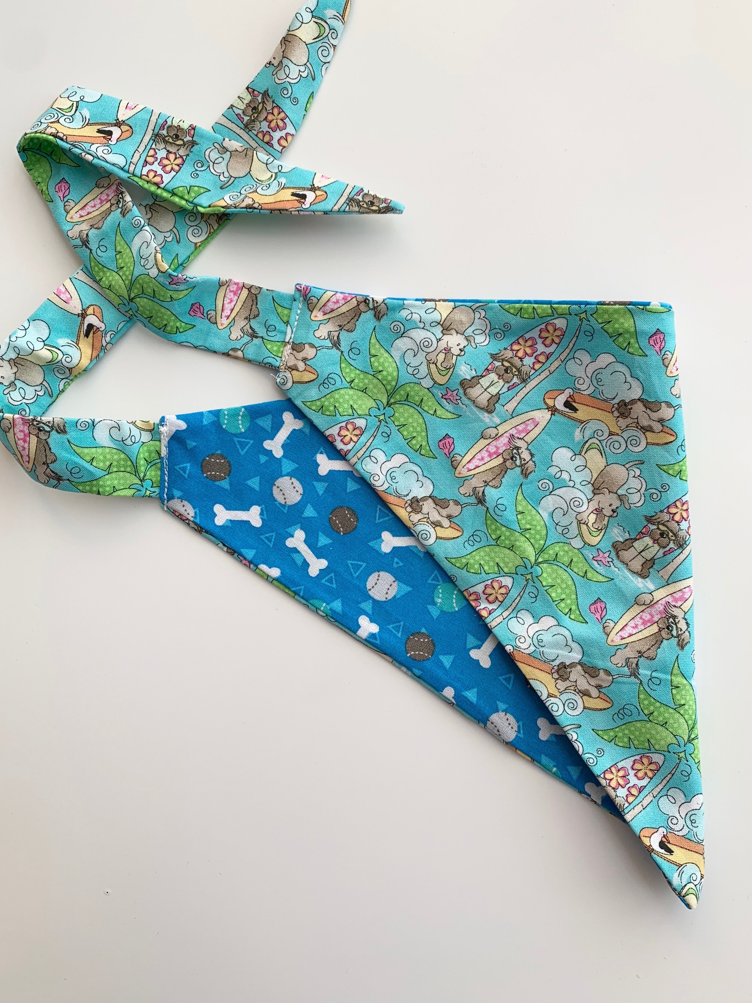 reversible dog bandana: surfing dog/ball + bones