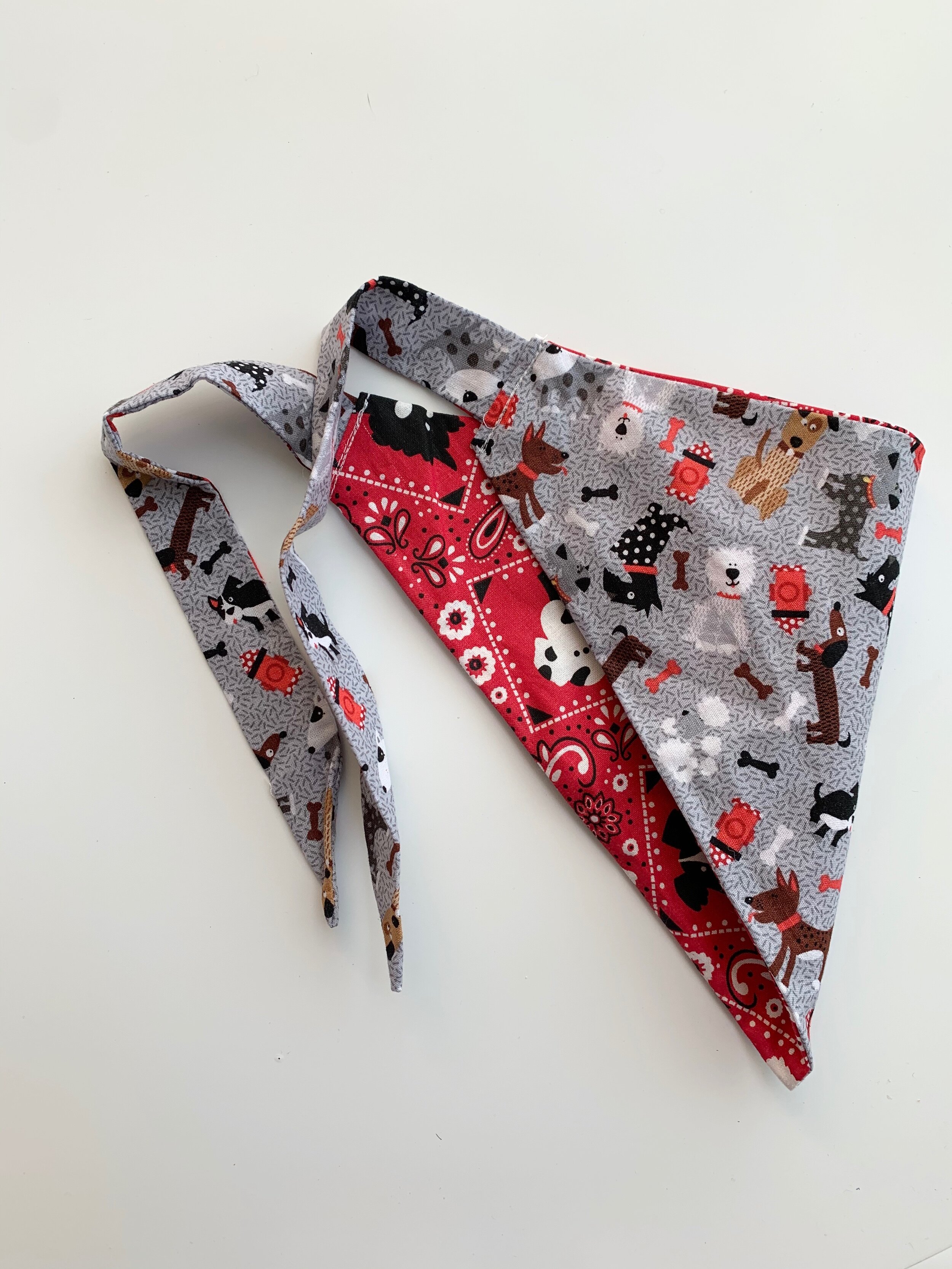 reversible dog bandana: grey dog life/red bandana