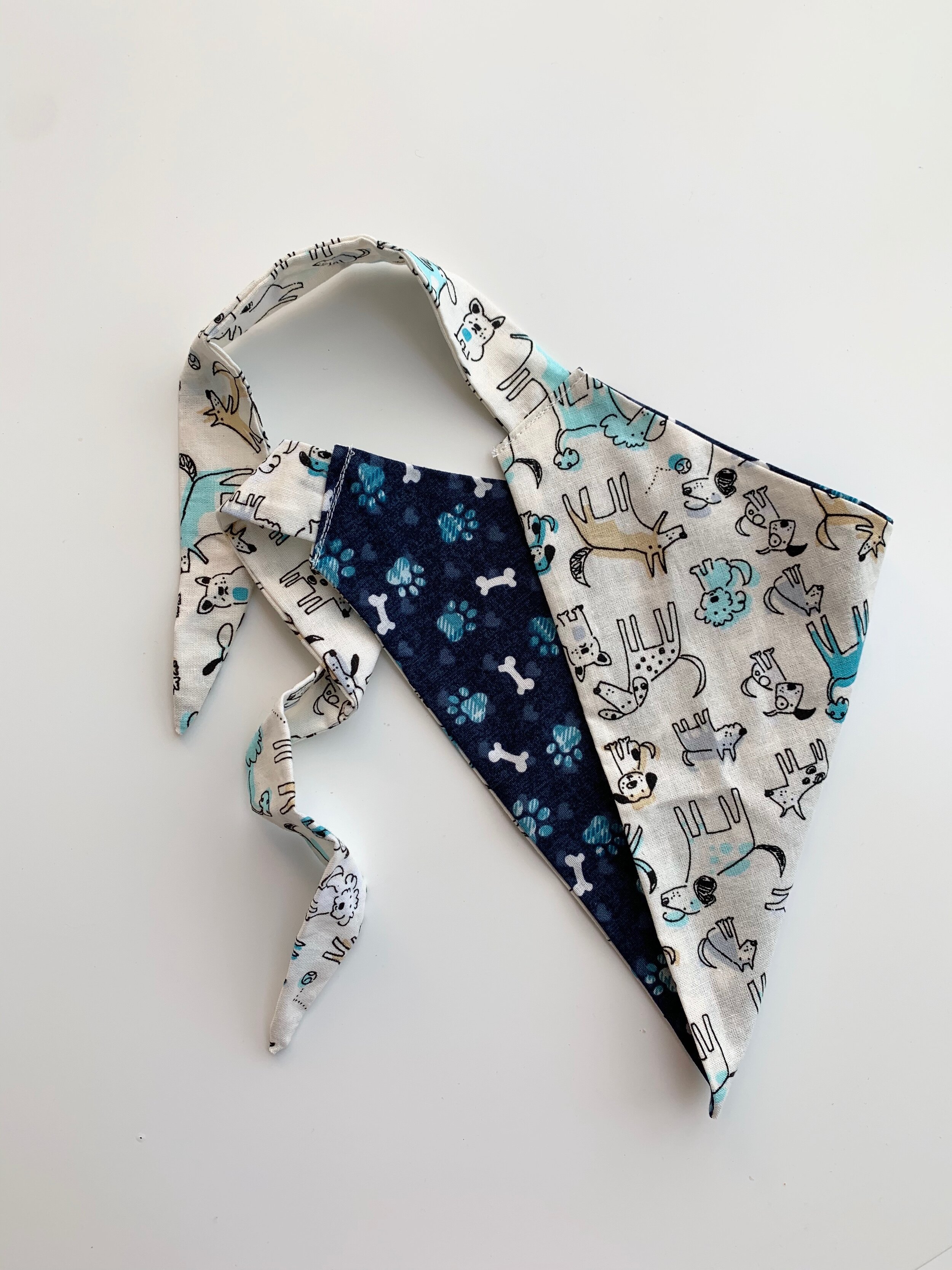 reversible dog bandana: dog life/ball + bones