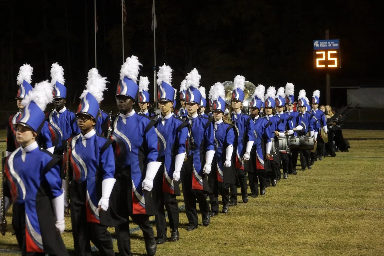 Geometric drawing of an outline square with sections divided by vertical, horizontal, and diagonal lines.