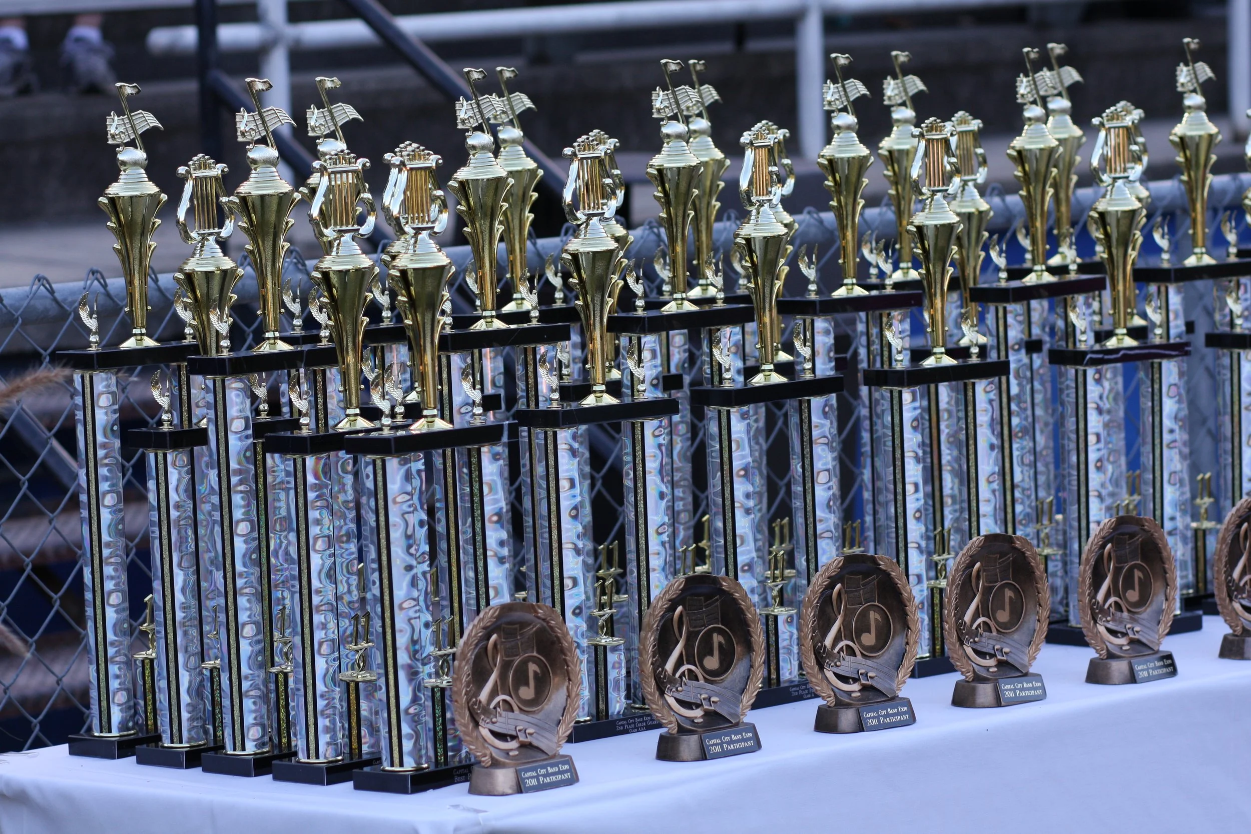 Geometric drawing of an outline square with sections divided by vertical, horizontal, and circle lines.