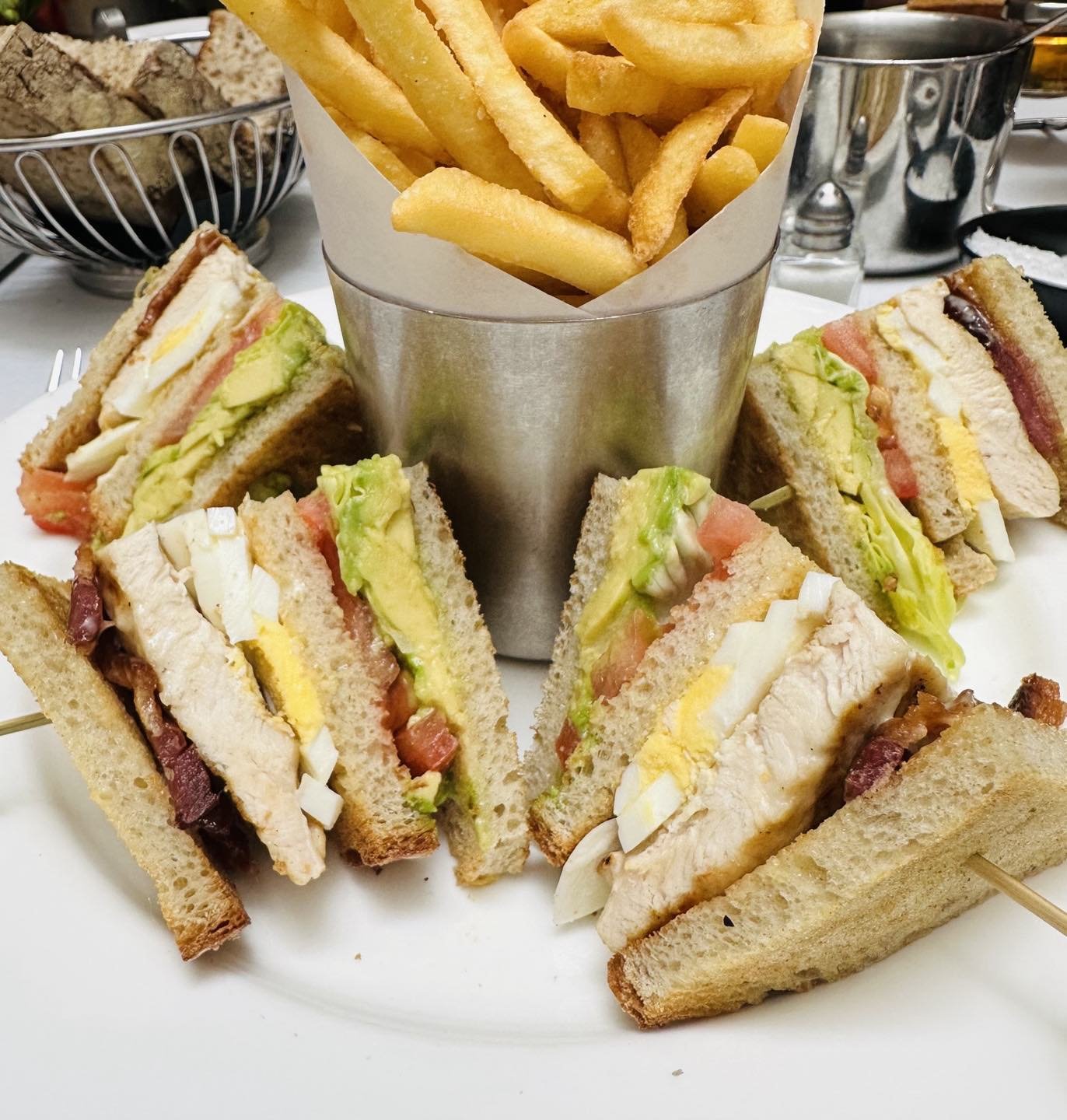 Diane&rsquo;s favorite lunch - a traditional roast turkey club sandwich with avocado and bacon.  It&rsquo;s the inspiration for our new club sandwich hors d&rsquo;&oelig;uvre.