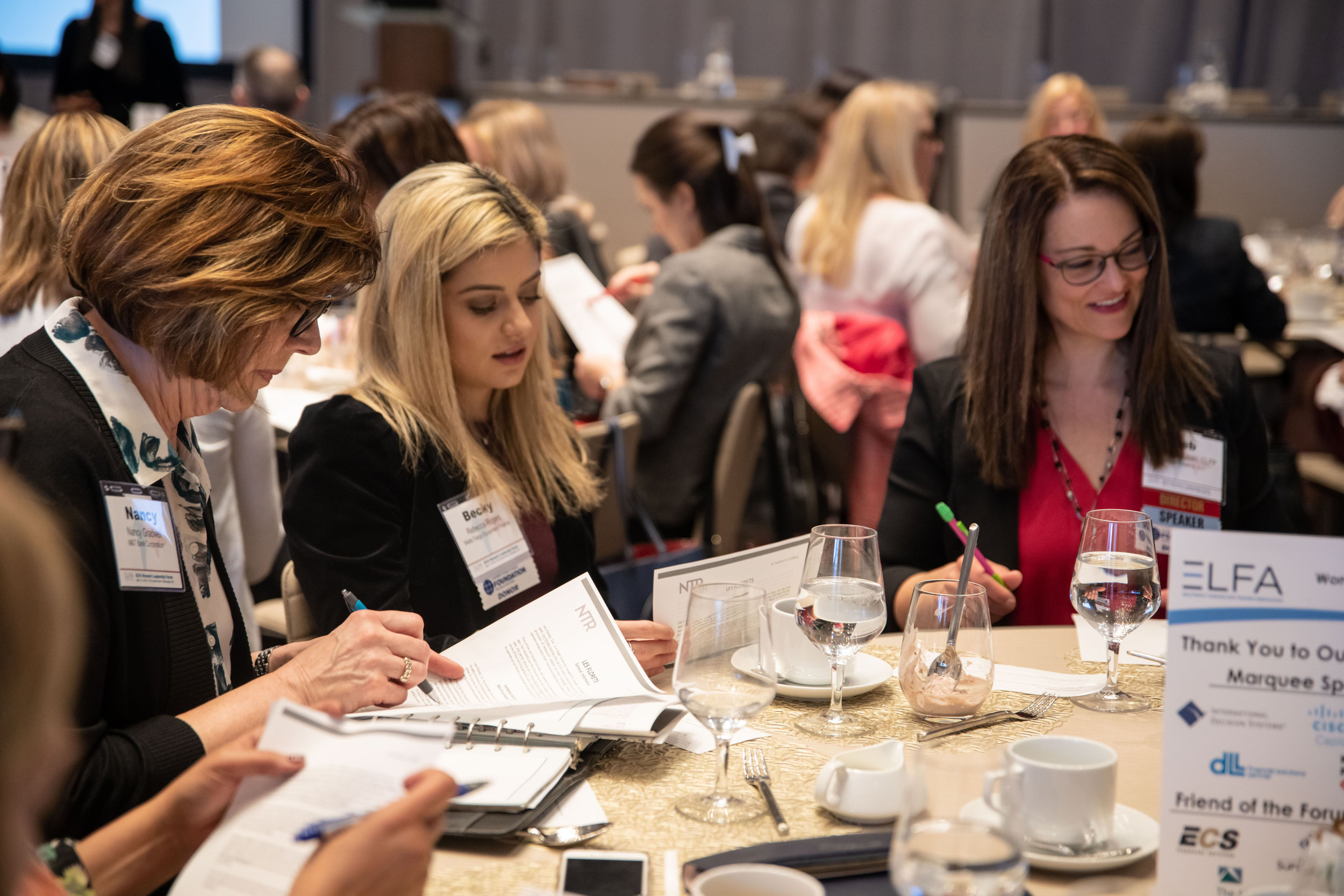 (L-R) Nancy Gradwell, Rebecca Rogers, and Deborah Reuben roleplay at a Women’s Leadership Forum workshop