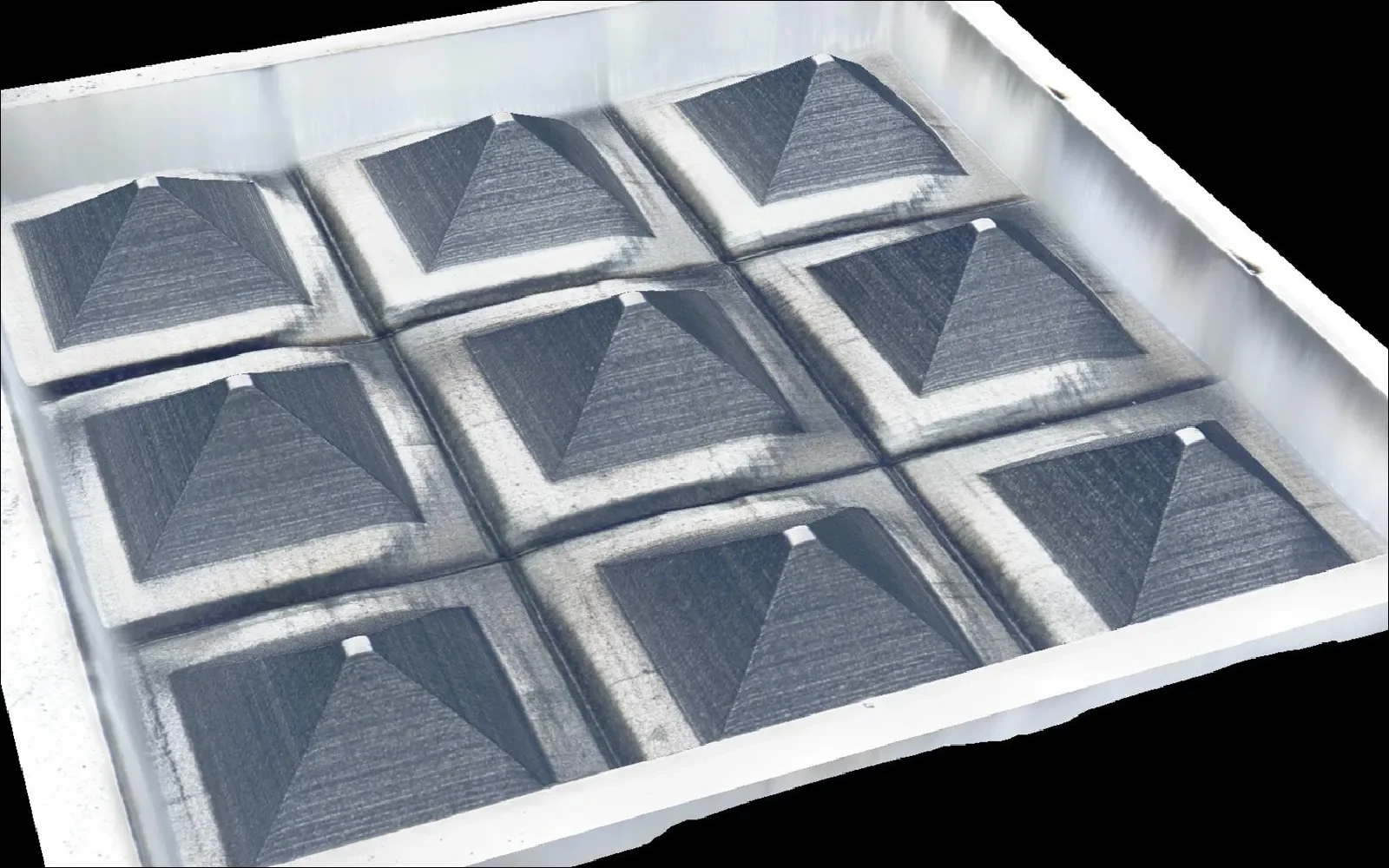 Tetrahedral microstructure array fabricated on silicon carbide