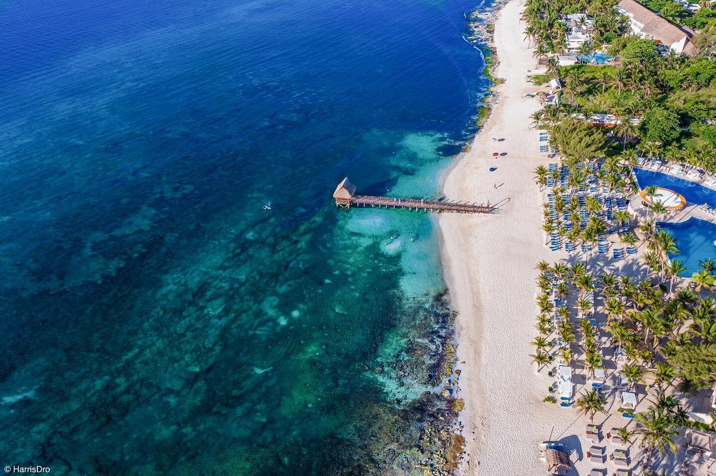 What a vista of sun, sand and clear blue sea - this pier is peerless! #mexico #rivieramaya #playdelcarmen #beach #beachlife #viceroy #viceroyhotel #drone #dronephotography 
.
.
.
.
.
#droneemperors #droneoftheday #bluesea #sandybeach #resort #beautif