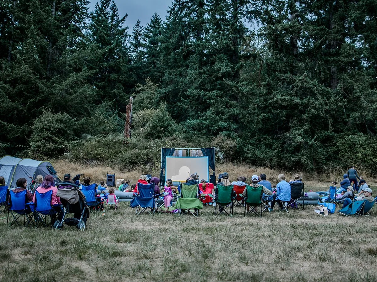 Festival movie screening at a camp site