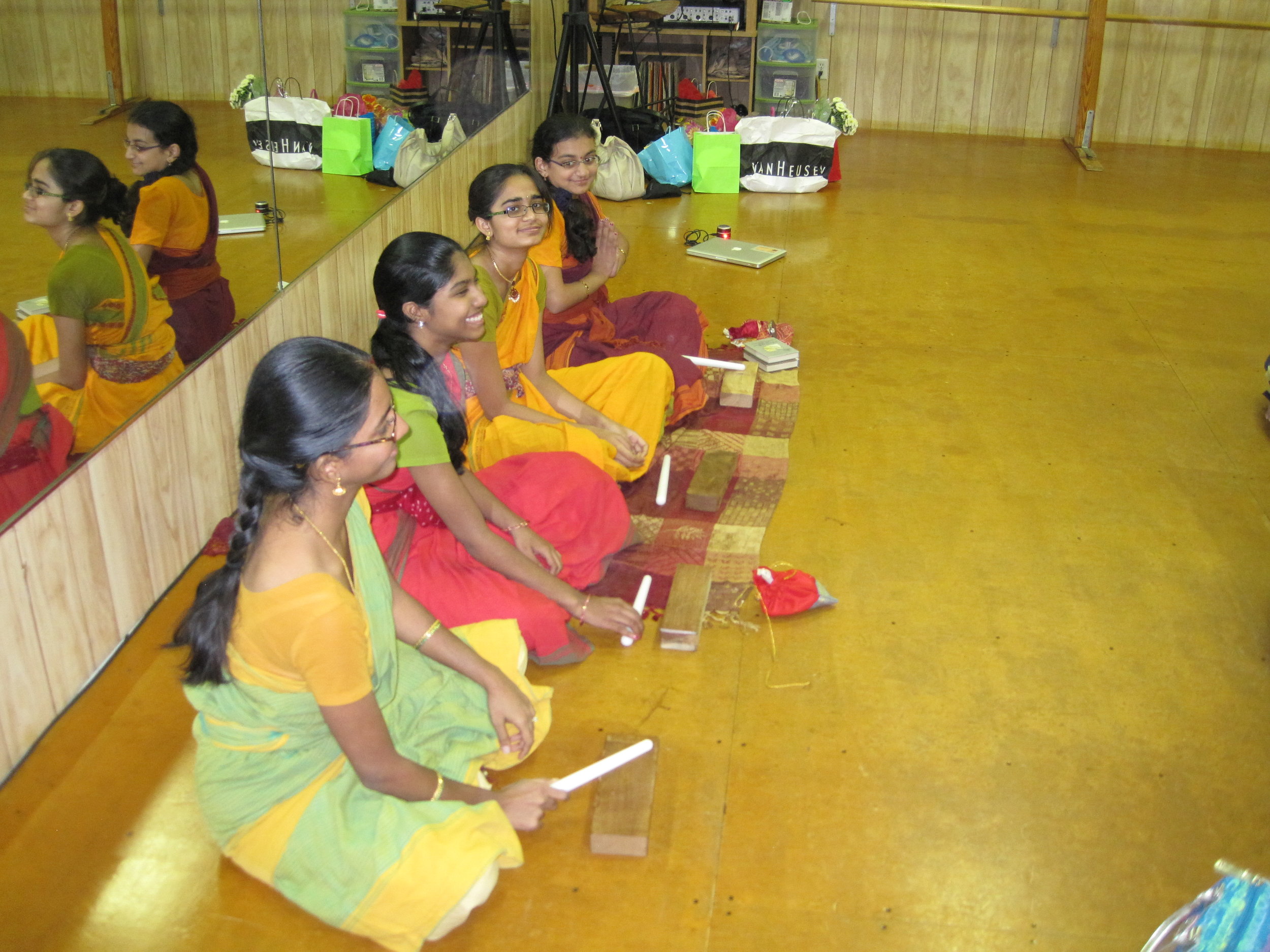 Students learning thattukazhi, 2012