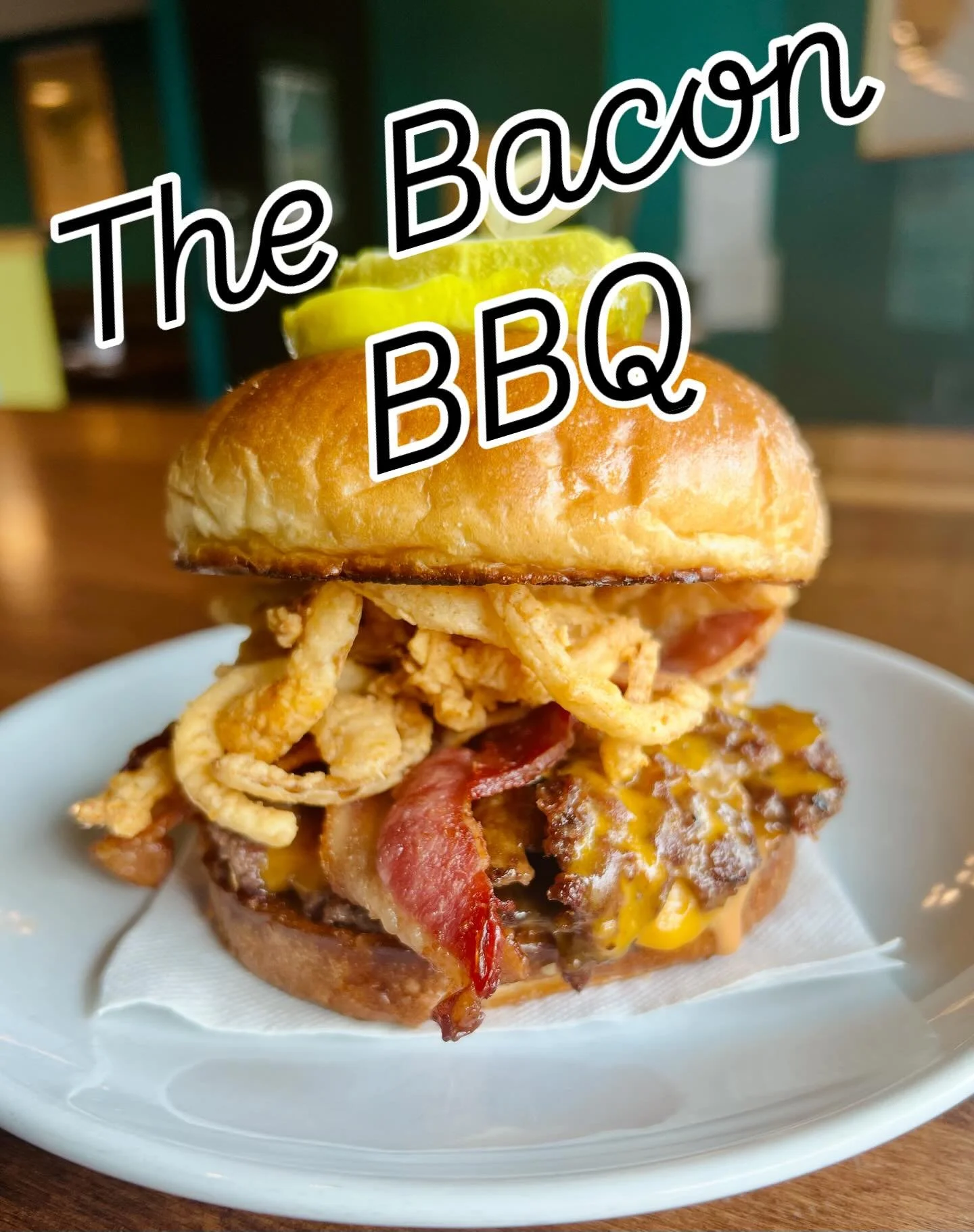 This Week&rsquo;s Feature: 
The Bacon BBQ Burger 
Stacked high with crispy bacon, melted cheddar, fried onion, and tangy BBQ aioli on a toasted bun.

Available this week only for Online Ordering!

#baconbbqburger #burgeroftheweek #smashburger #burger