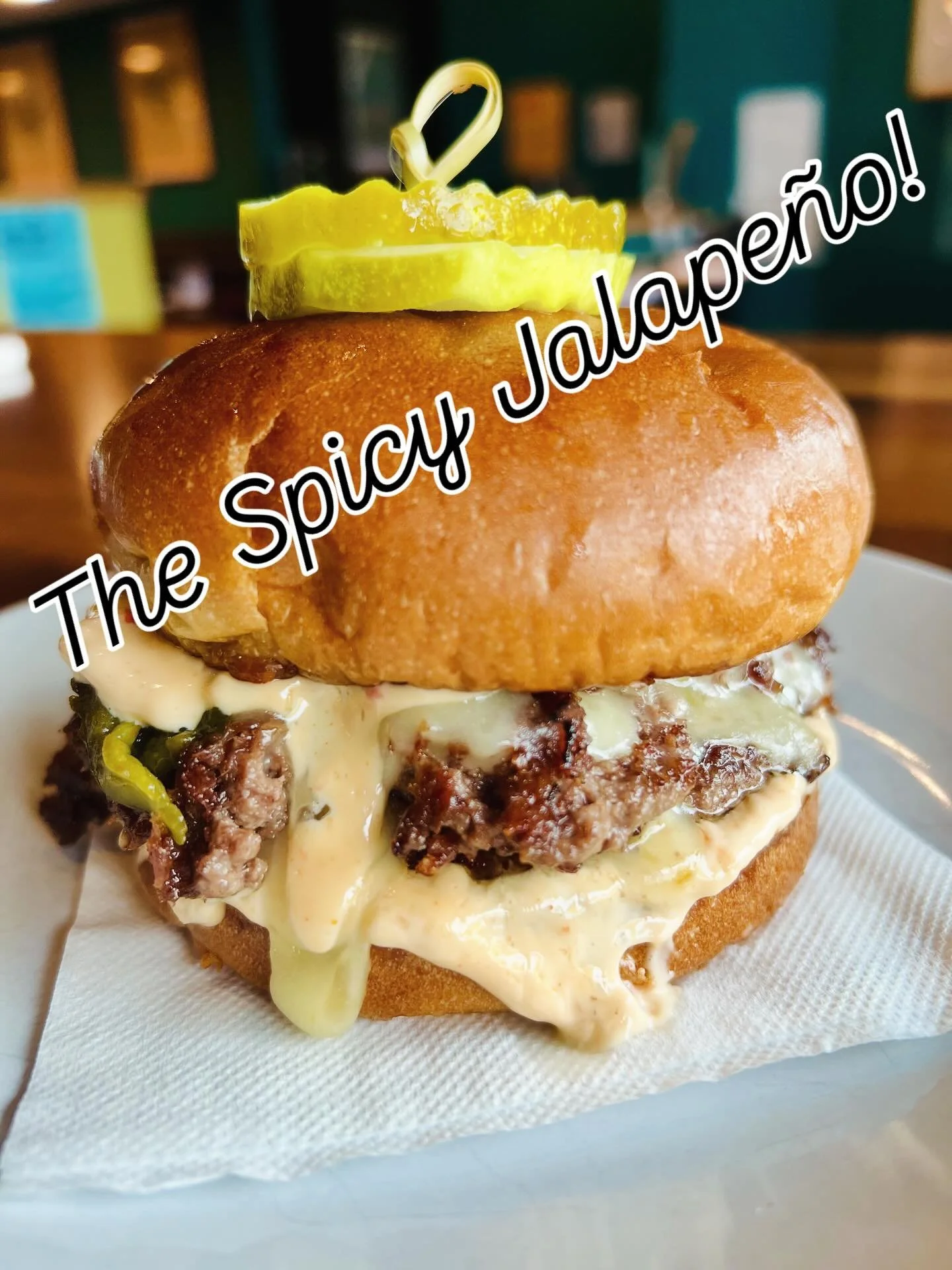 Turn up the heat 🔥 
Our Spicy Jalape&ntilde;o Smash Burger is stacked with crispy edges, melty cheese, pickled heat, and our house sauce. Bring a napkin (or two)

#smashburgers #spicyburger #jalapenoburger #mnfoodie #twincitieseats #weststpauleats #