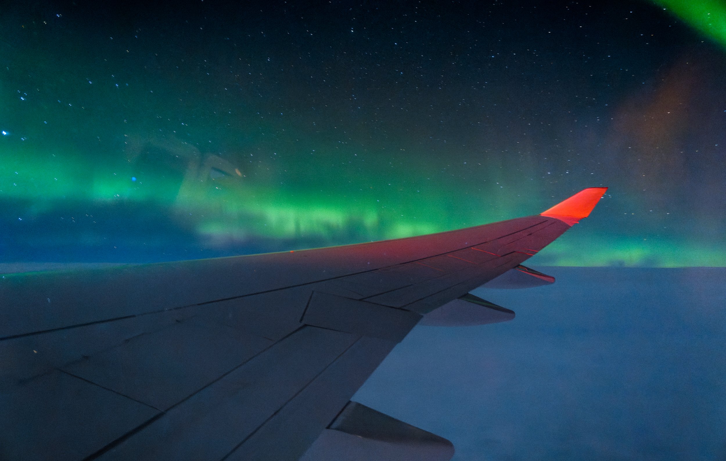 How to Photograph the Northern Lights From an Airplane