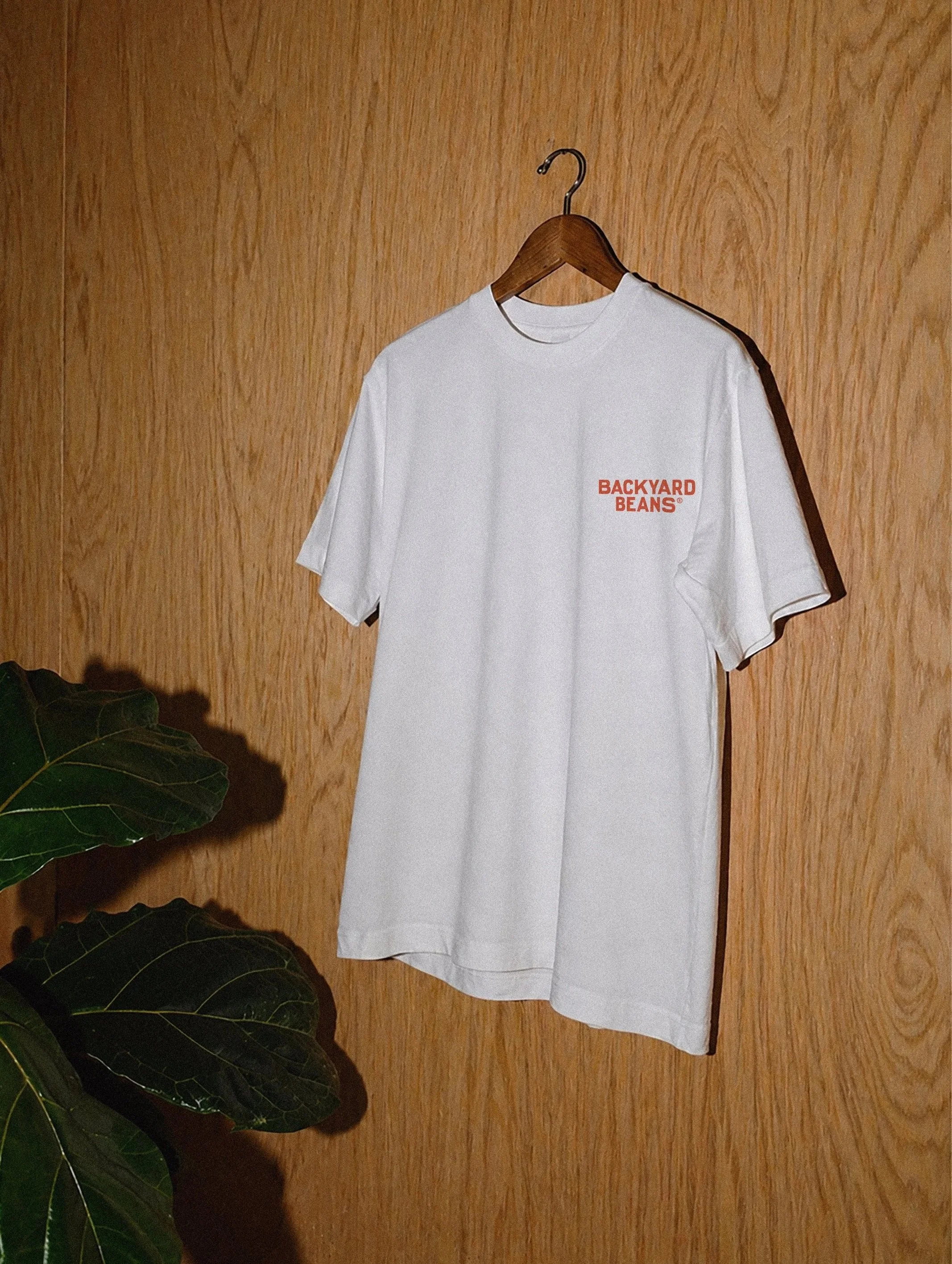 Custom apparel t-shirts design for Backyard Beans Coffee brand identity.