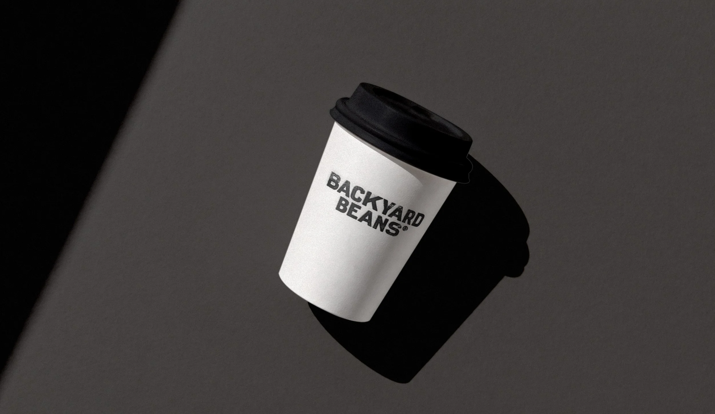 A to-go cup design for Backyard Beans Coffee.