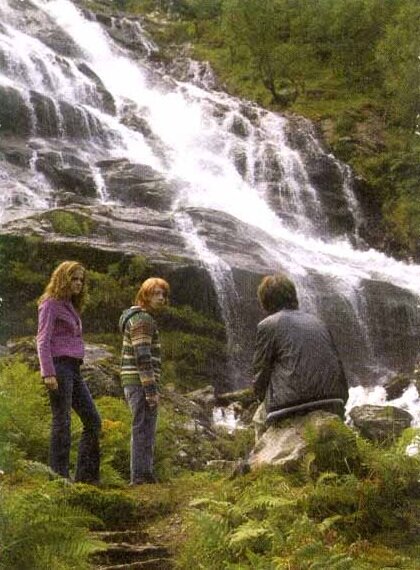 Hermione and Ron find Harry alone on the Hogwarts Grounds.jpg