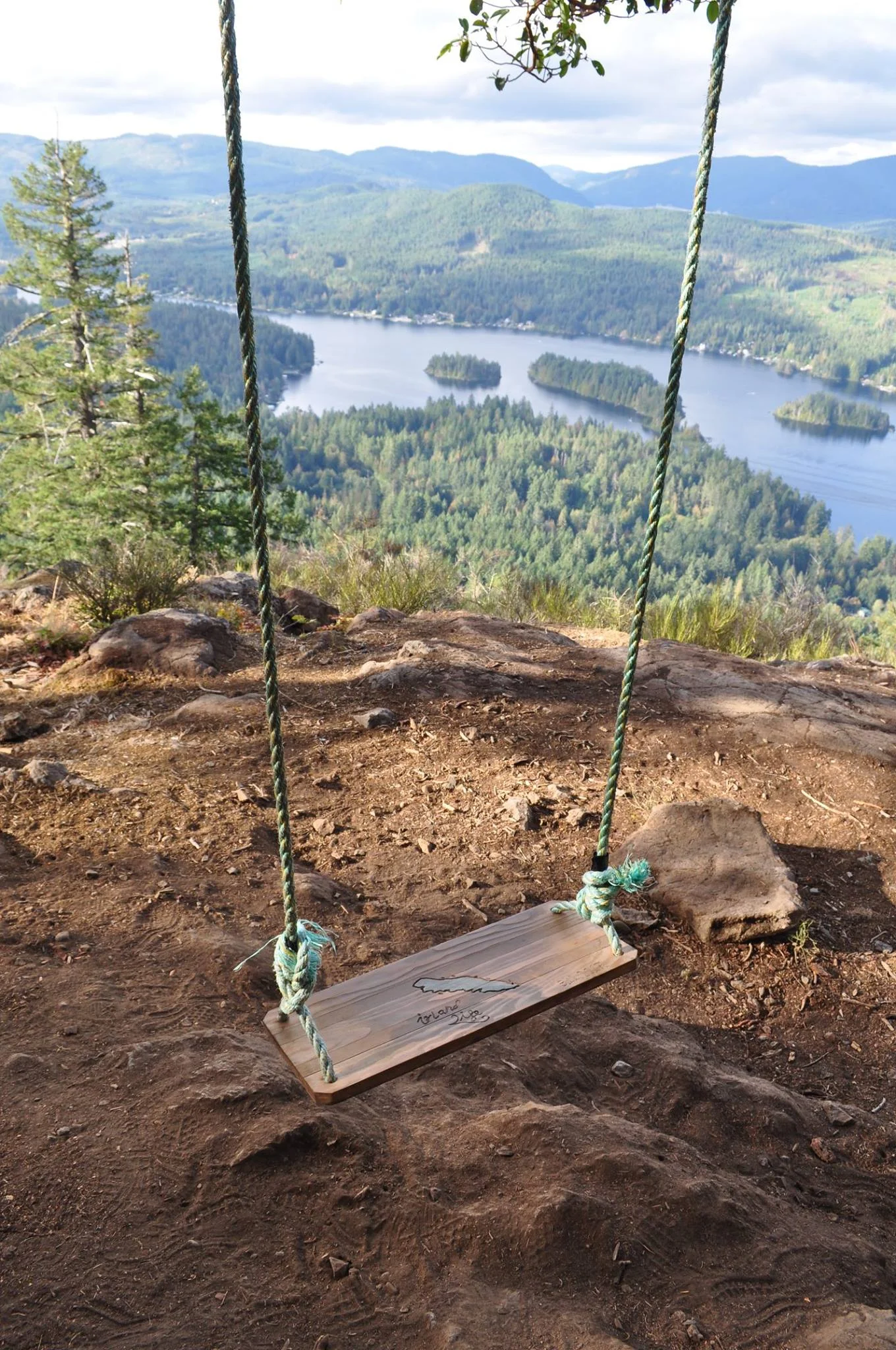 1. Old Baldy Mountain Old Baldy Mountain is a super easy hike with a beautiful view but it has a bit of a drive to get to it. This hike starts right near Shawnigan Lake (turn left from Mill Bay onto Shawnigan Lake-Mill Bay Road, left onto Sylvester Rd, right onto Baldy Mountain Rd, left onto Hawking Rd, there is usually cars at the edge of the road to determine the start of the hike and there are two starting spots that are basically the same level of difficulty and distance). This is a short 2.4km hike that takes about 30- 40 minutes depending on your fitness level and sports beautiful views of the lake and a homemade swing with a sentimental story. The hike is quite steep gaining 208m of elevation within the short distance but it is worth the view.