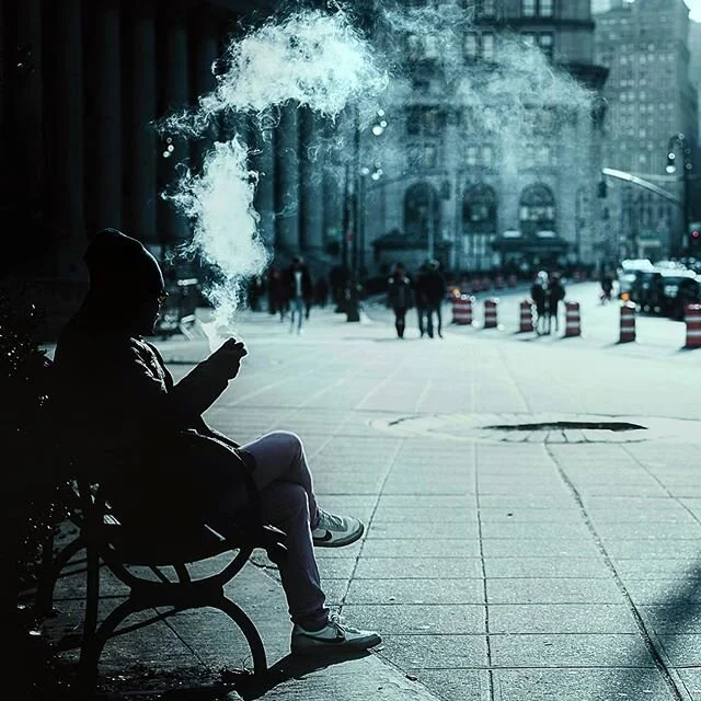 cooling out. // nyc
&bull;
&bull;
&bull;
#streetphotography #street_photography #nycstreetphotography 
#street_ig #ig_captures #ig_nycity 
#silhouette #silhouettephotography 
#nyc #newyorkcity #smoke 
#streetshot #sonyalpha #capturethemoment #chillwa