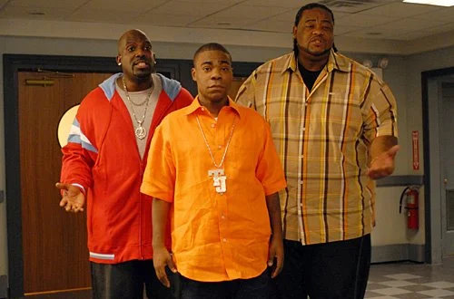 30 ROCK -- Episode 210 -- Pictured: (l-r) Kevin Brown as Dotcom, Tracy Morgan as Tracy Jordan, Grizz Chapman as Grizz | Courtesy of Nicole Rivelli/NBC/NBCU Photo Bank via Getty Images