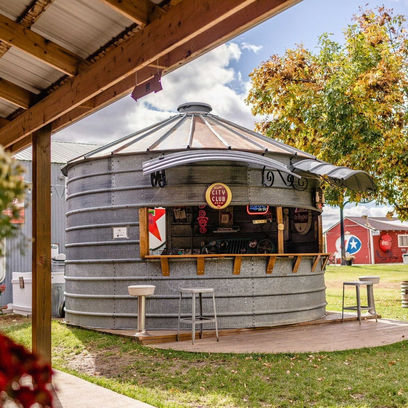 Our Grain Bin Bar, a great photo spot, its also so interesting on it's own!  Filled with an ever growing, always changing collection of beer signage, its a sight to study! 
.
Wedding guests enjoy looking at the various collections, and the Grain Bin 