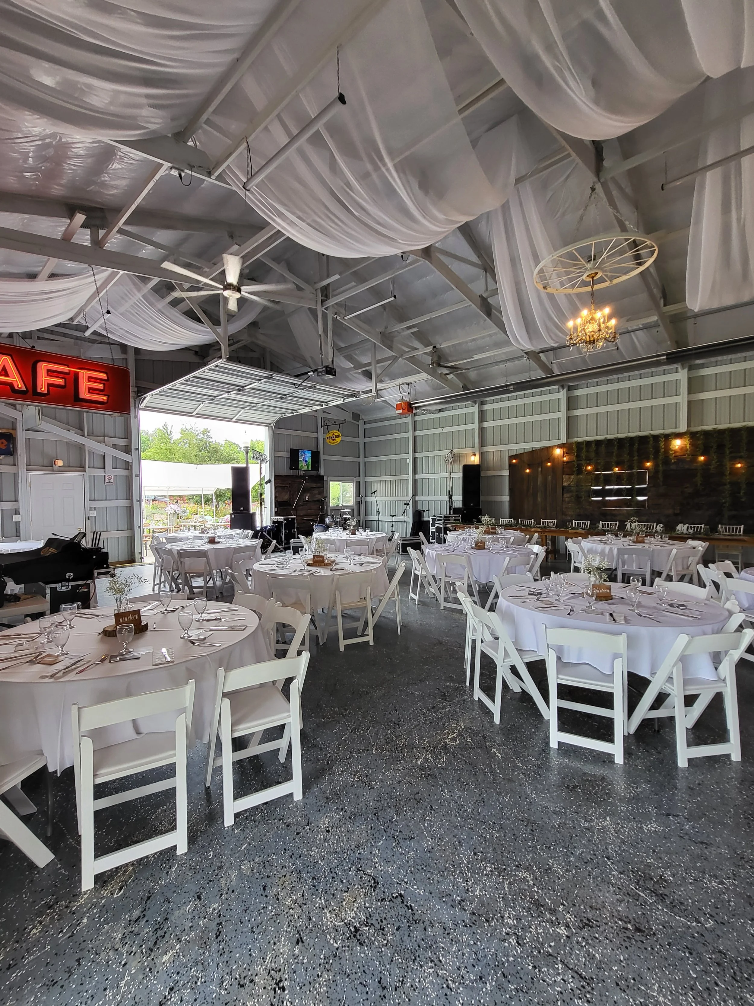 Interior of the banquet barn at Adler Ranch wedding venue near Alexandria, Minnesota, set for a reception with tables, chairs, and layout arranged for a smooth guest flow and a fully prepared wedding experience