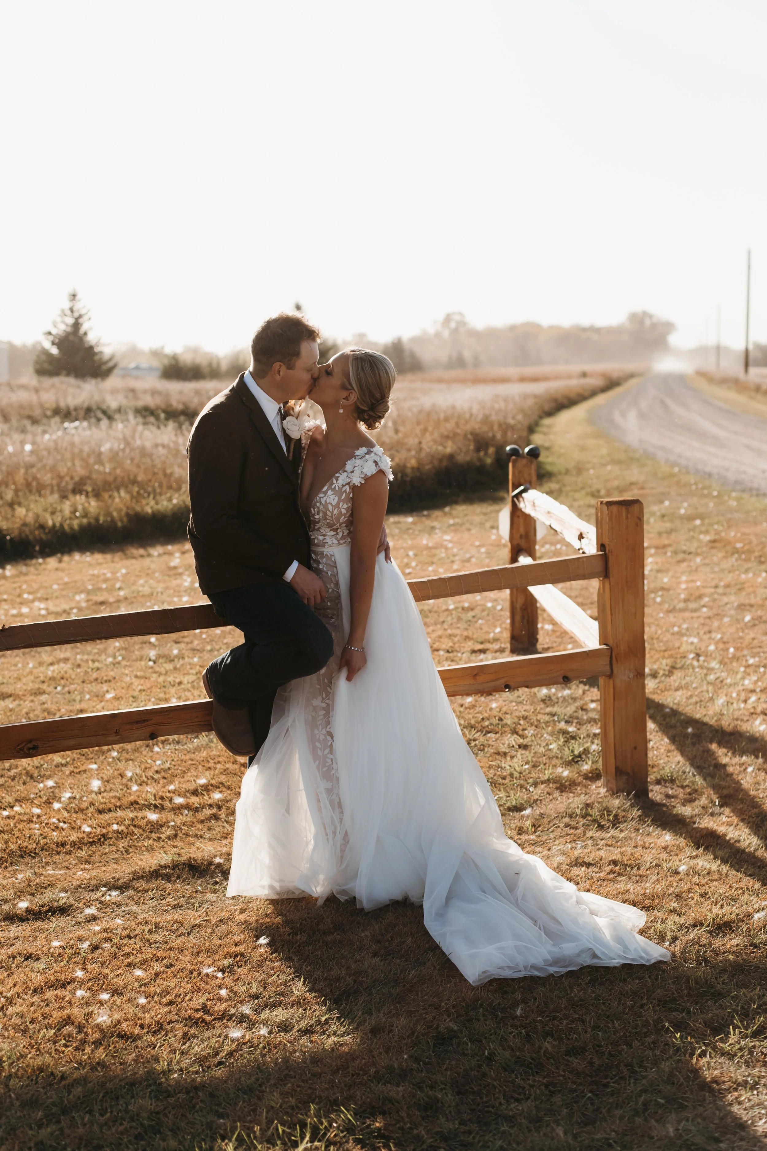 Bride & Groom kissing at Adler Ranch Wedding Venue located about two hours from both Minneapolis MN and Fargo ND
