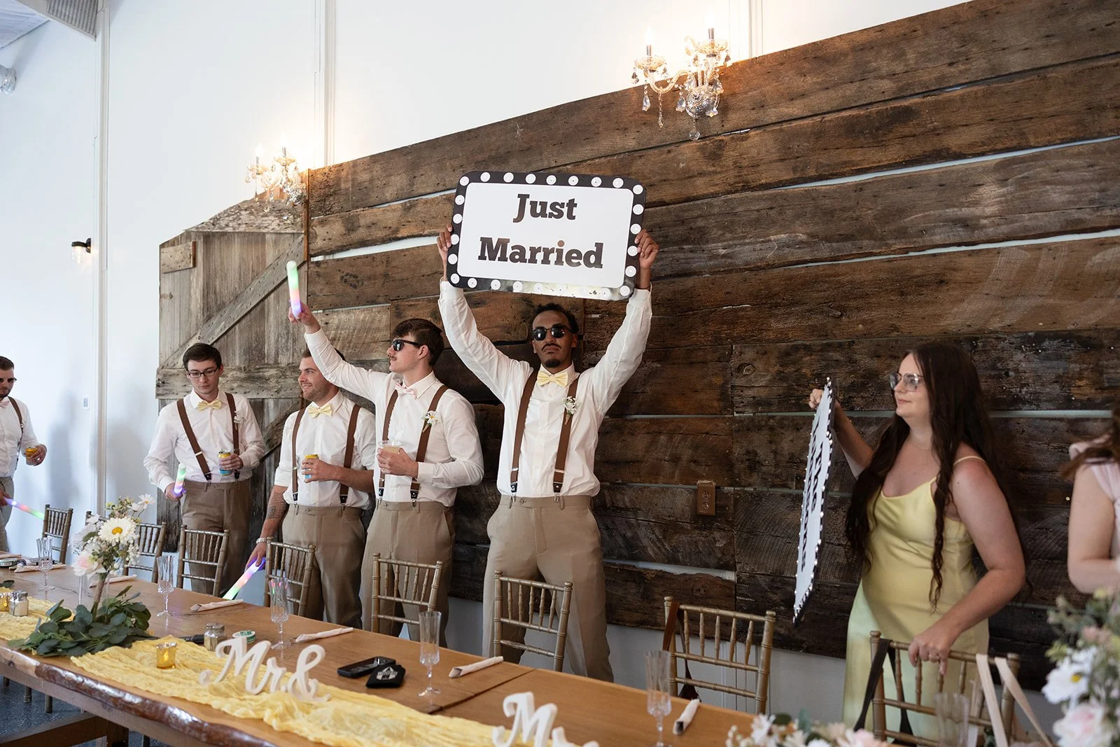 Wedding party celebrating in the banquet barn at Adler Ranch Wedding Venue near Alexandria MN