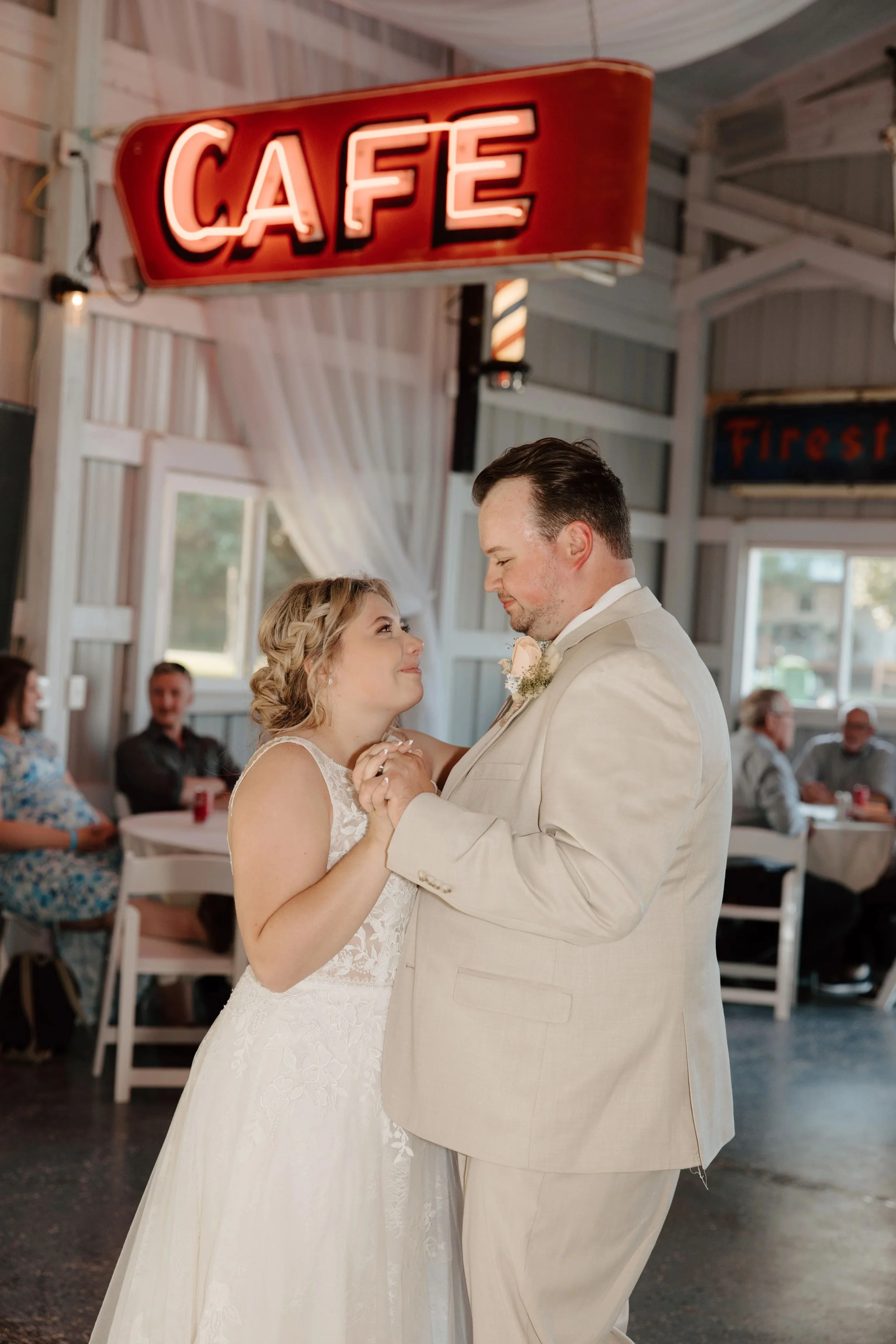 Bride & Groom enjoy their first dance at Adler Ranch Wedding Venue near Alexandria MN