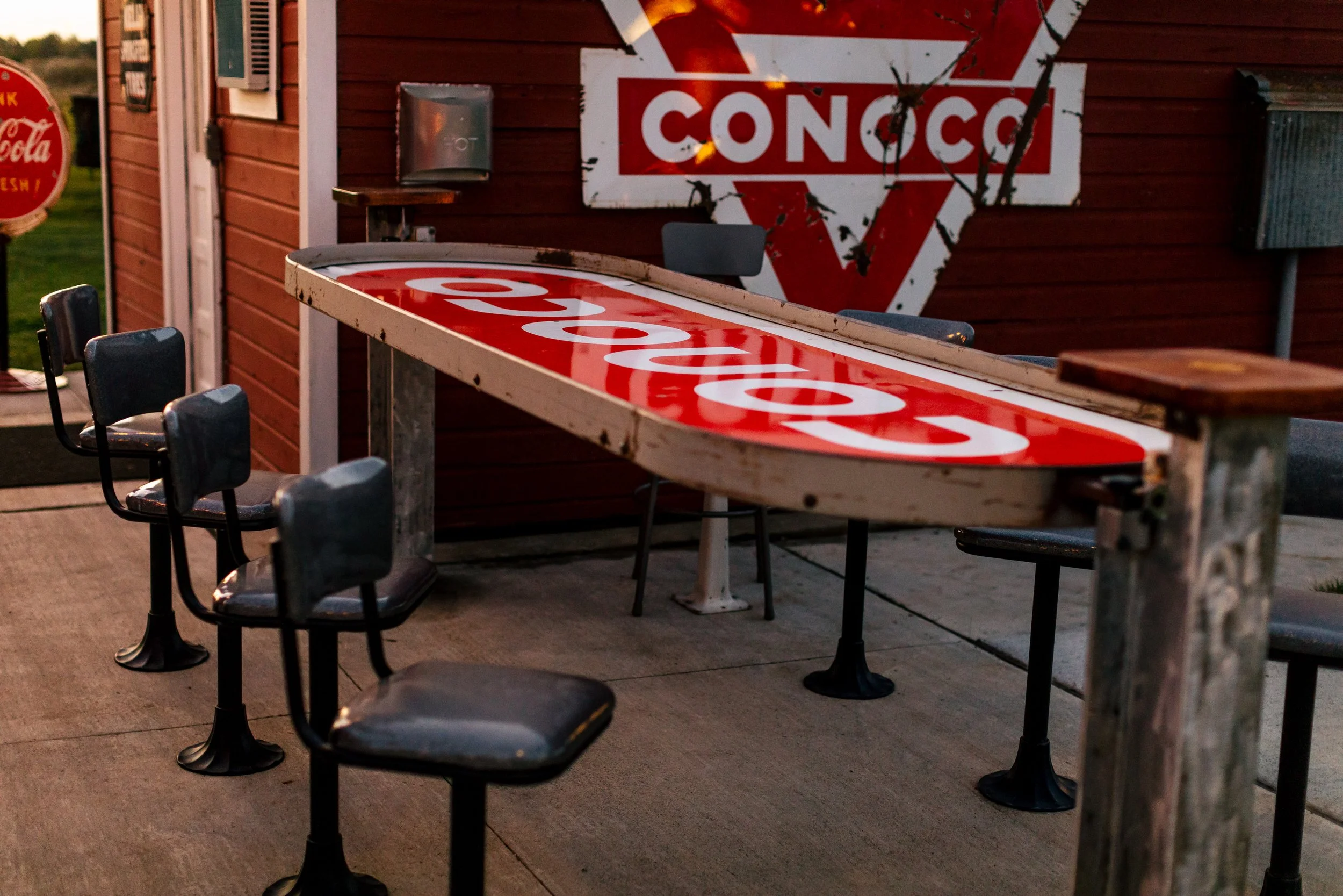 The Conoco bar with bar seating at Adler Ranch Wedding Venue