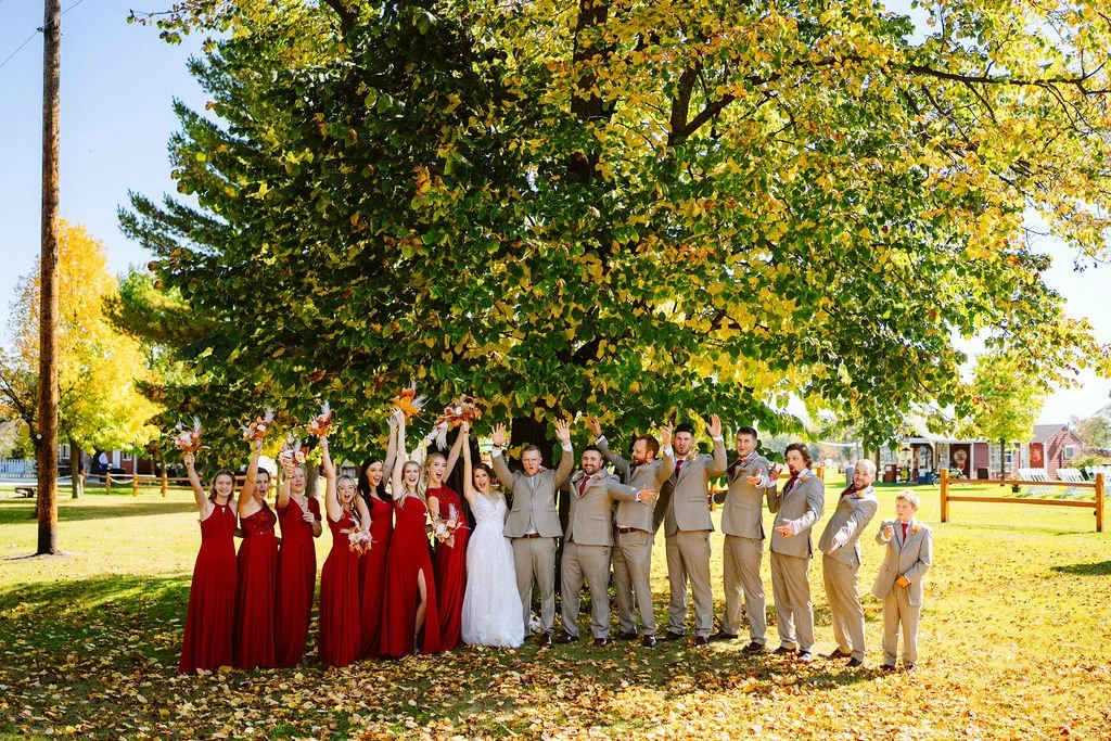 Wedding party celebrating at the venue grounds at MN Wedding Venue Adler Ranch