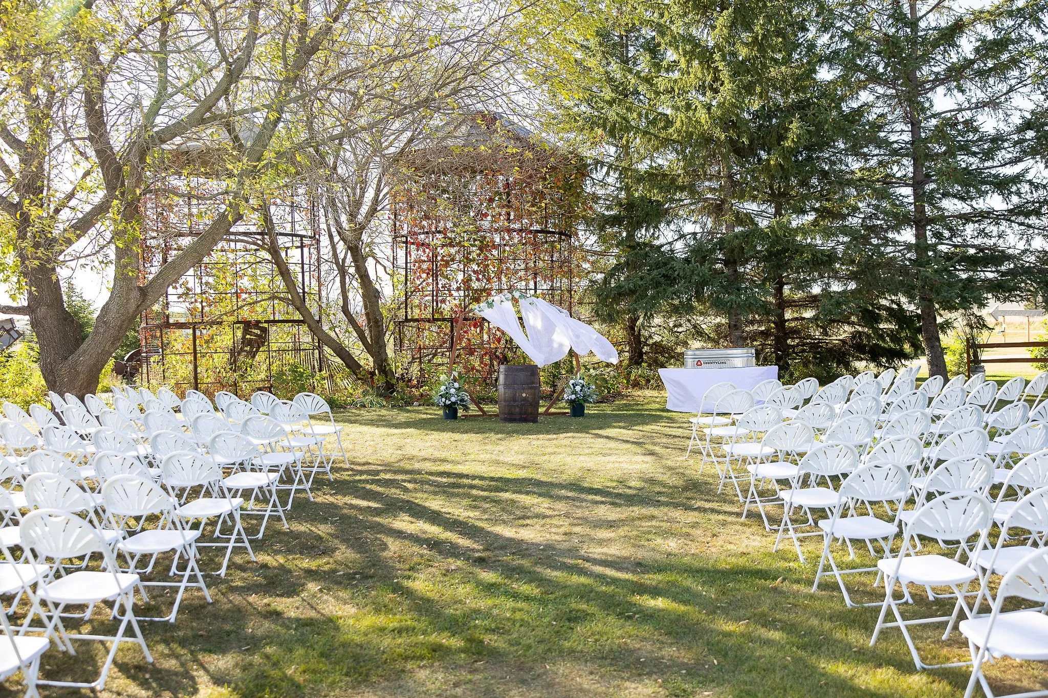 Mid October wedding ceremony setting at Adler Ranch Wedding Venue located about two hours from Fargo ND and the Twin Cities metro