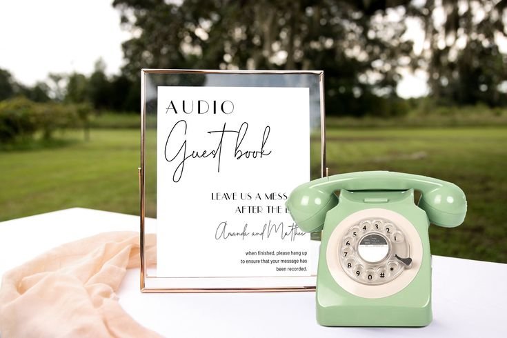 photo of a rotary telephone and sign for an audio guestbook. Adler Ranch MN Wedding venue